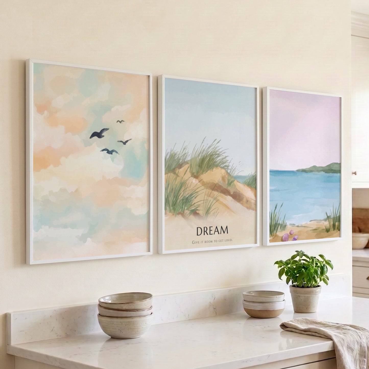 Poster set featuring a coastal landscape with sand dunes and the word dream displayed.