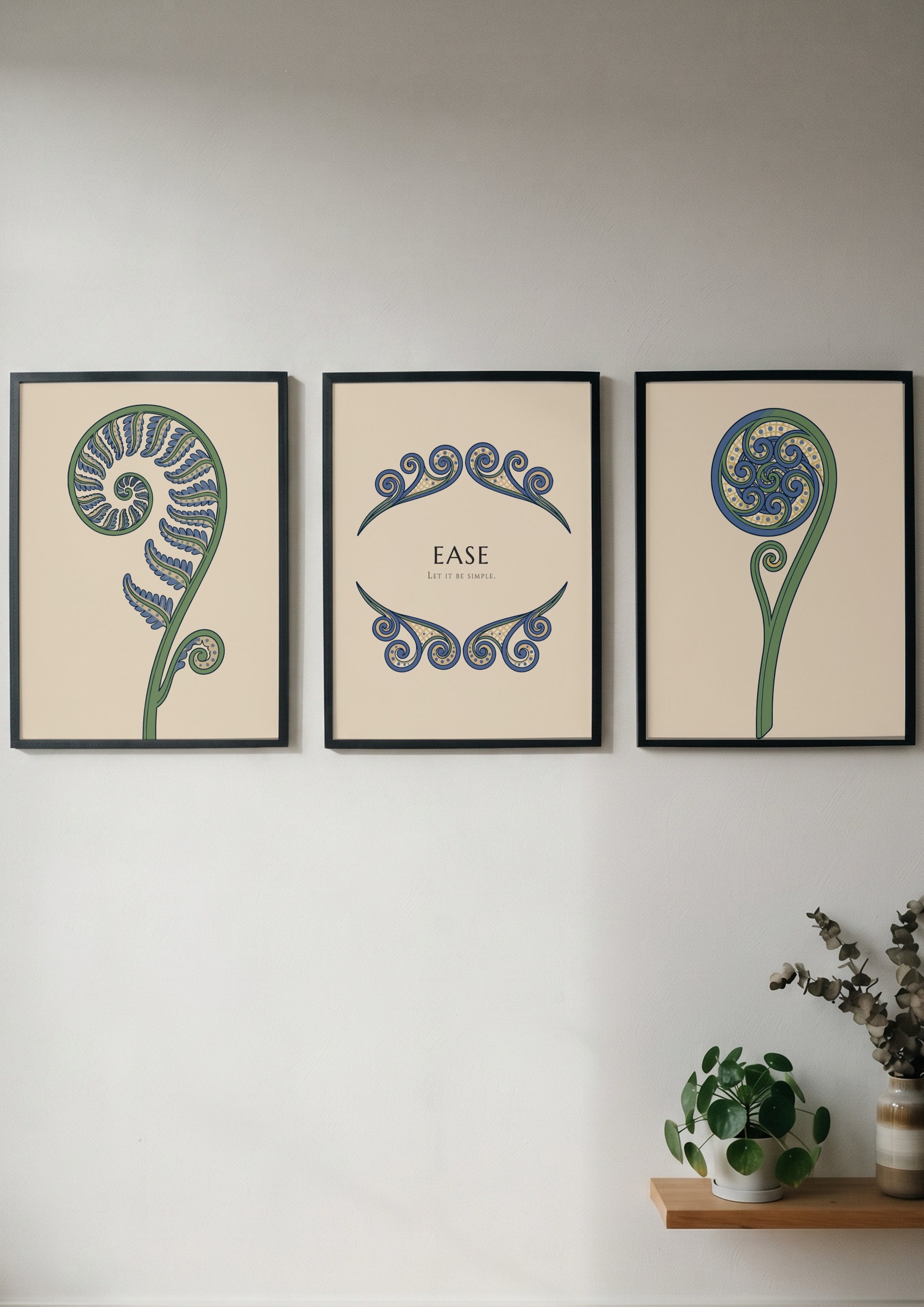 Poster triptych featuring blue and green fern fronds on a light cream background