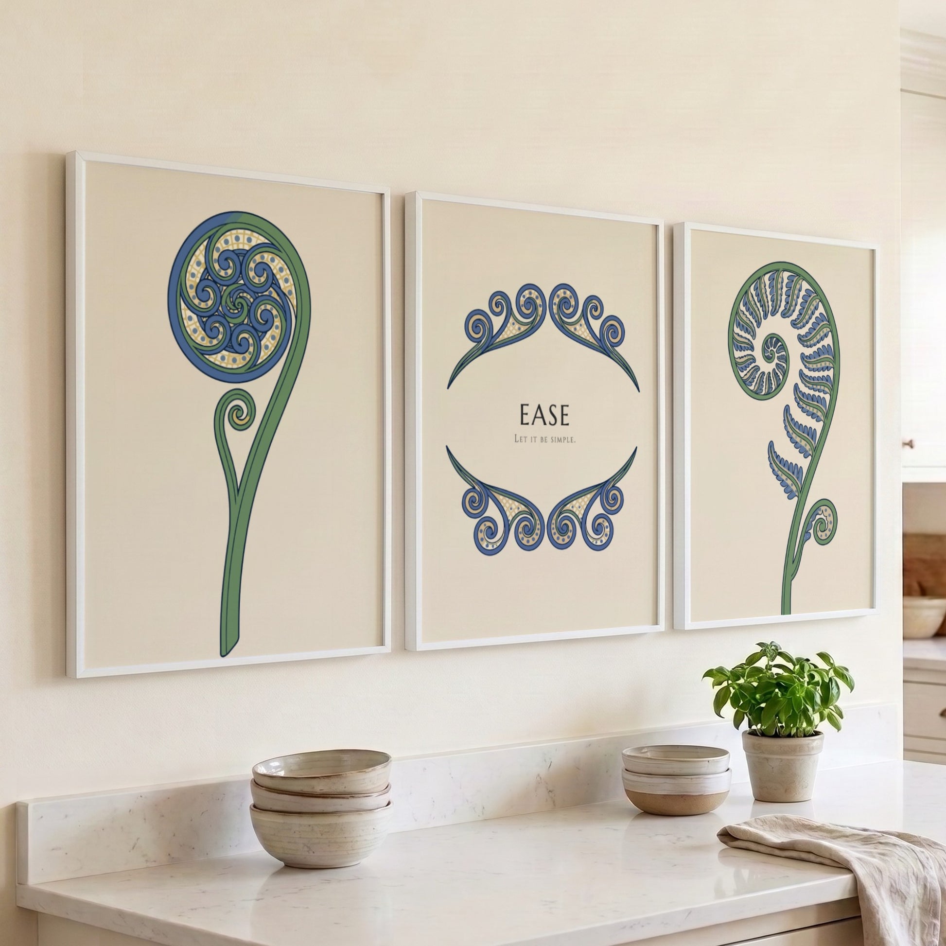 Poster triptych featuring blue and green fern fronds on a light cream background