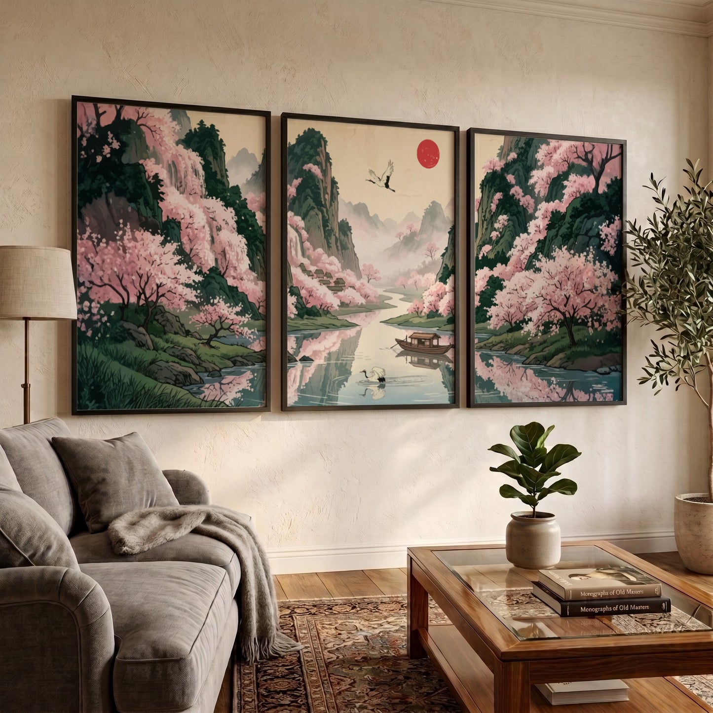 Three framed Japanese landscape panels featuring pink cherry blossoms, a river, and mountains.