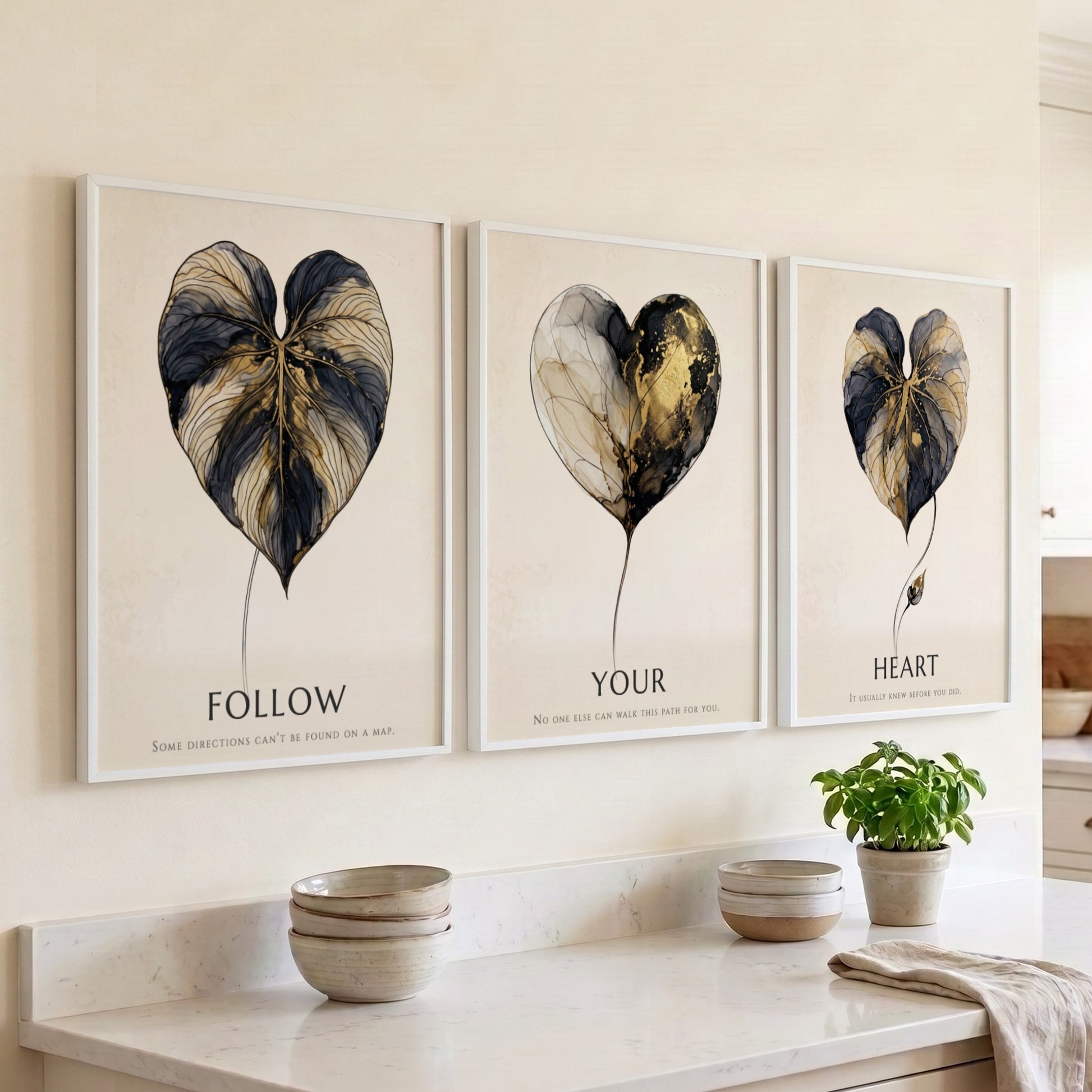 Poster triptych featuring golden leaf illustrations and the words Follow Your Heart minimalist