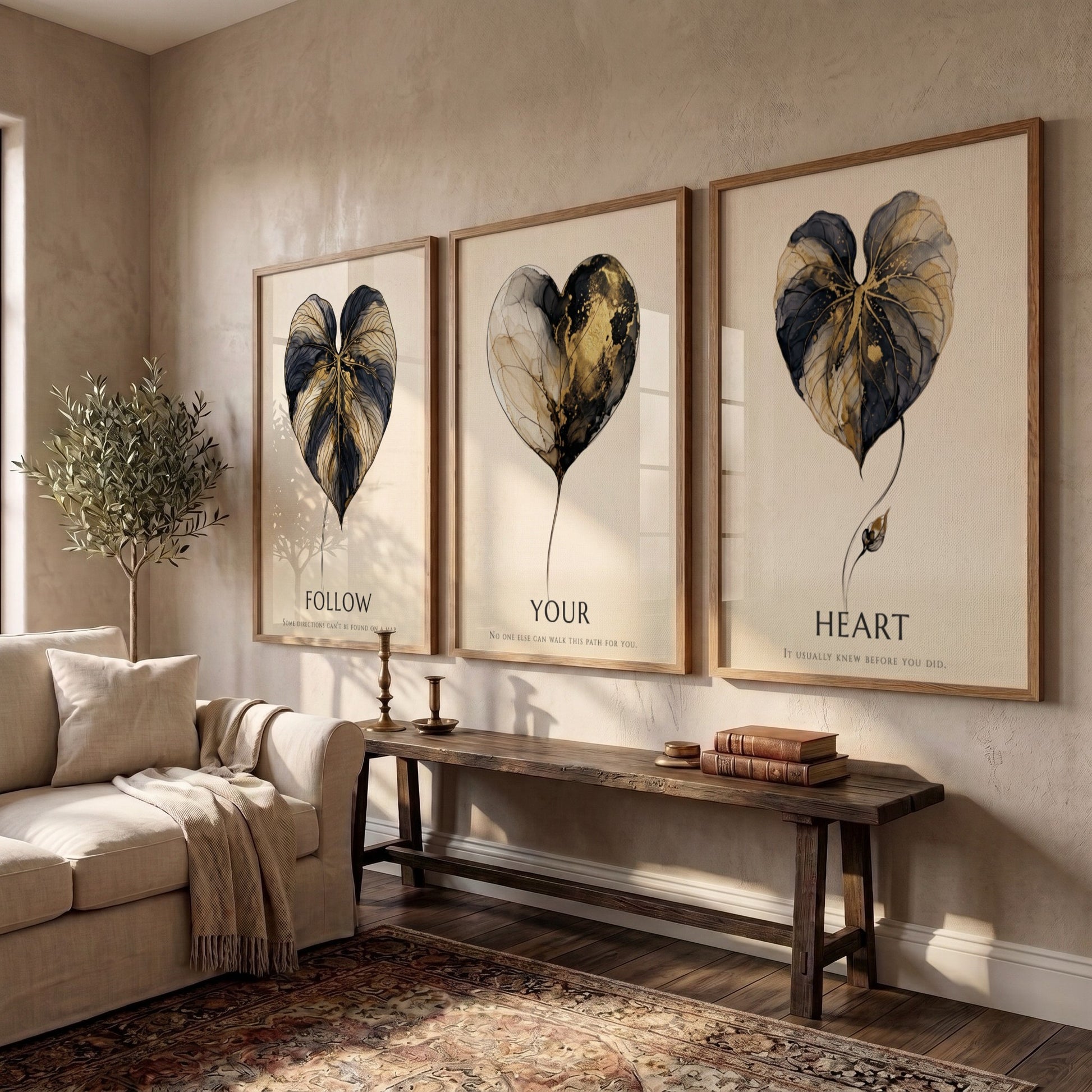 Poster triptych featuring golden leaf illustrations and the words Follow Your Heart minimalist
