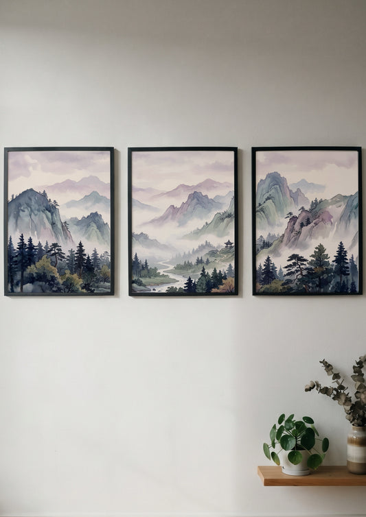 Triptych of Japanese mountain valley landscape prints in soft watercolour blues and lavenders.