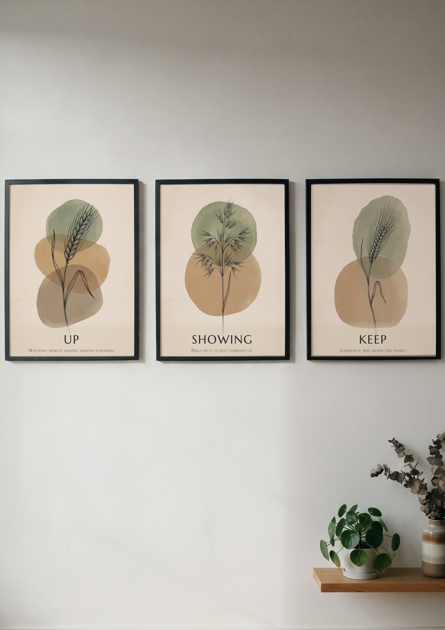 Poster set featuring botanical illustrations with Keep Showing Up text in earth tones