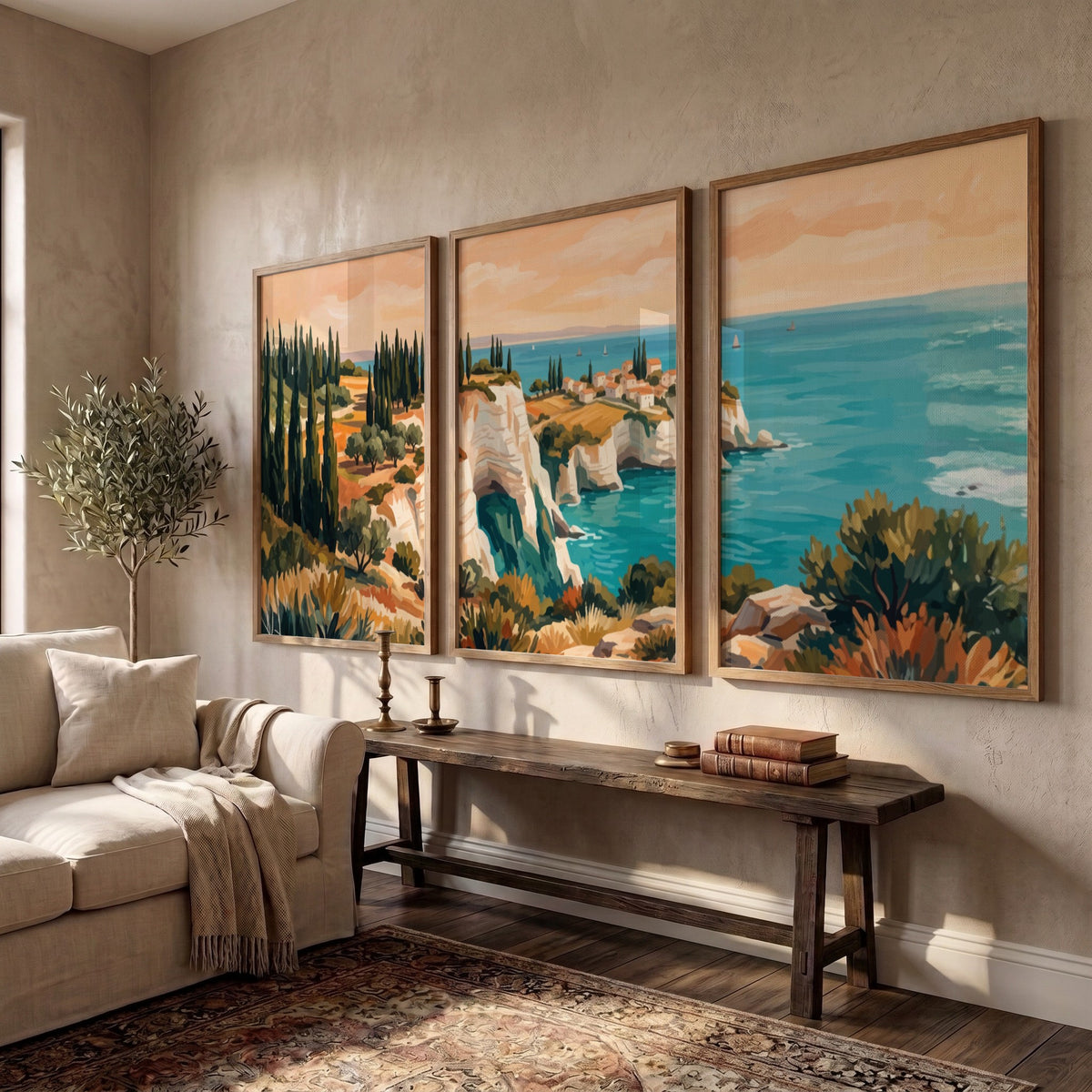 Three framed landscape prints showing Mediterranean cliffs cypress trees and blue ocean water