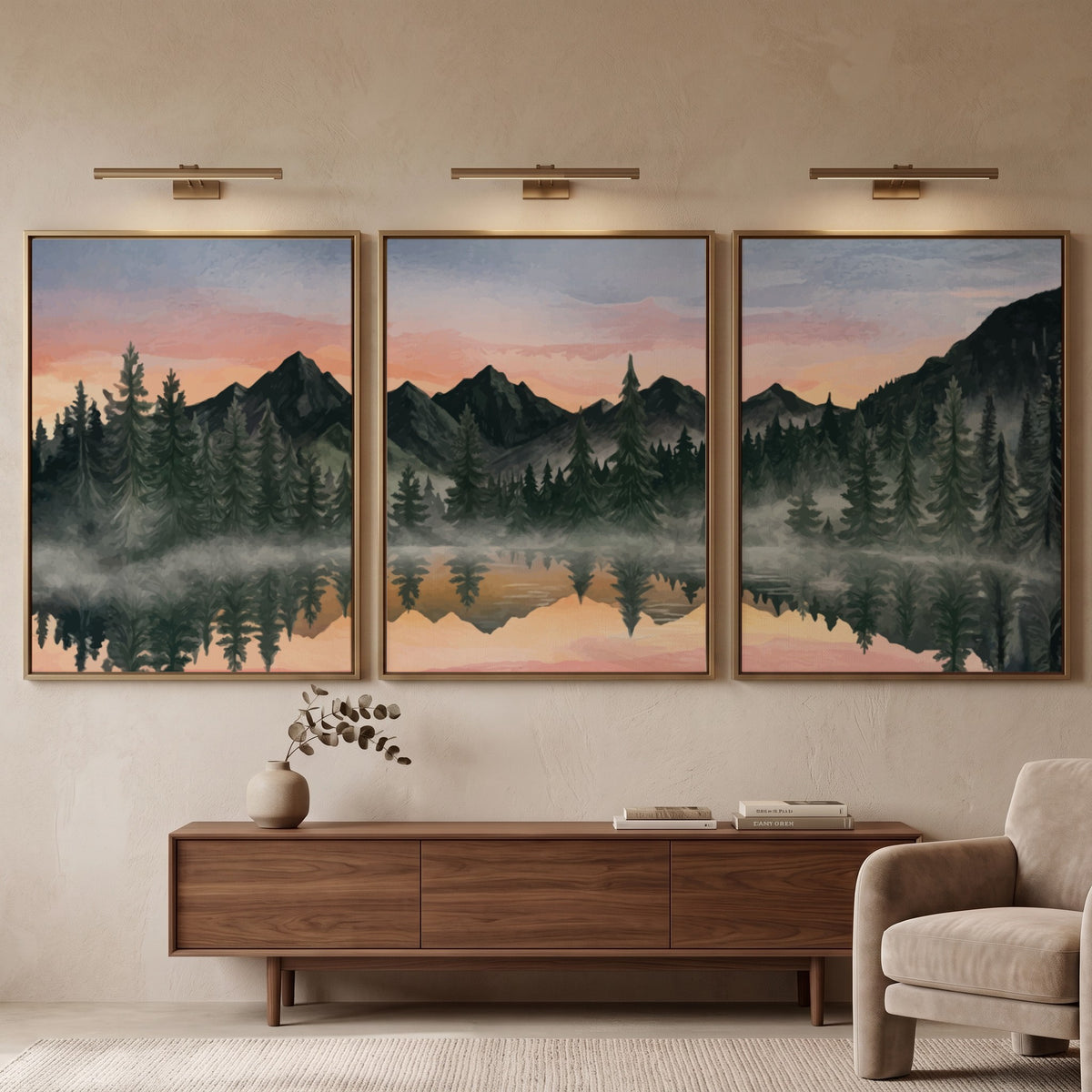 Three framed landscape prints showing misty mountains and pine trees reflected in water