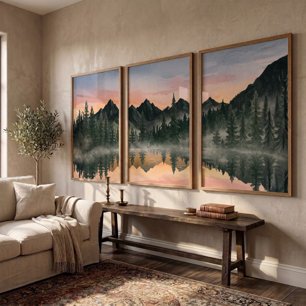 Three framed landscape prints showing misty mountains and pine trees reflected in water