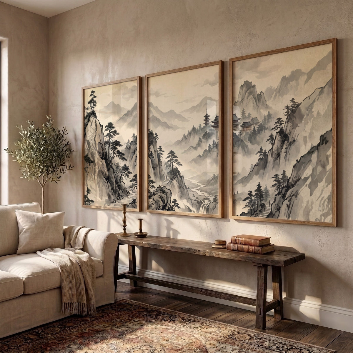 Three framed Japanese ink wash mountain landscapes with pine trees and misty valleys