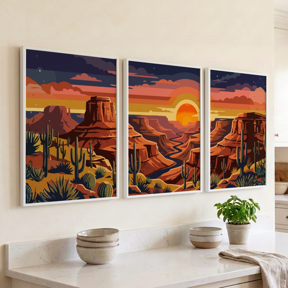 Three framed desert landscape prints featuring red canyons, saguaro cacti, and sunset skies.