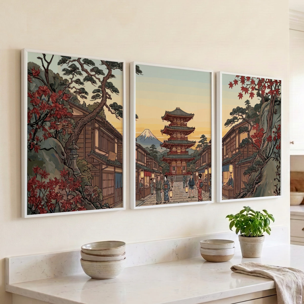 Three vertical framed prints featuring a Japanese pagoda landscape with autumn trees and mountain
