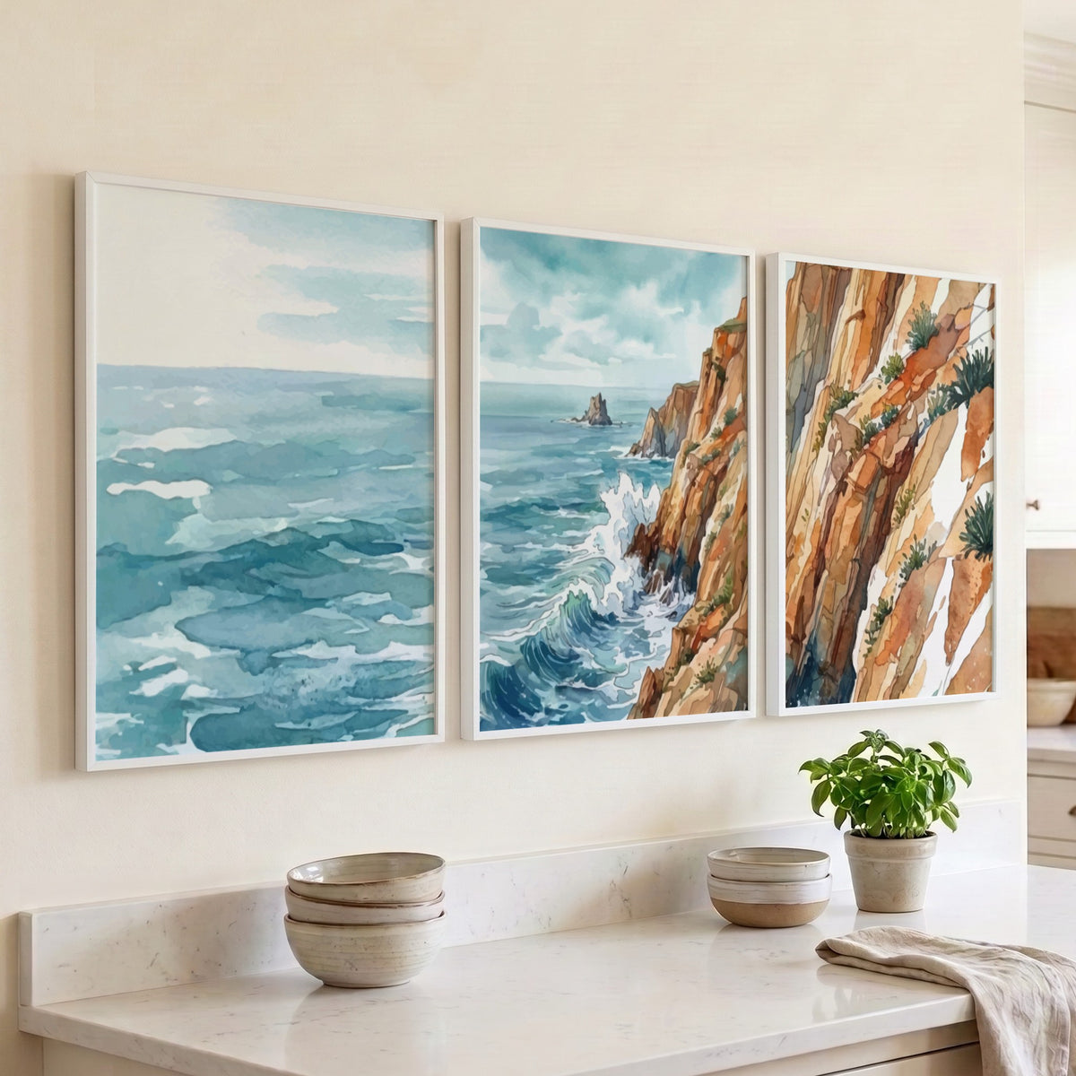 Coastal triptych watercolour print showing ocean waves and rugged cliffs in blue tones