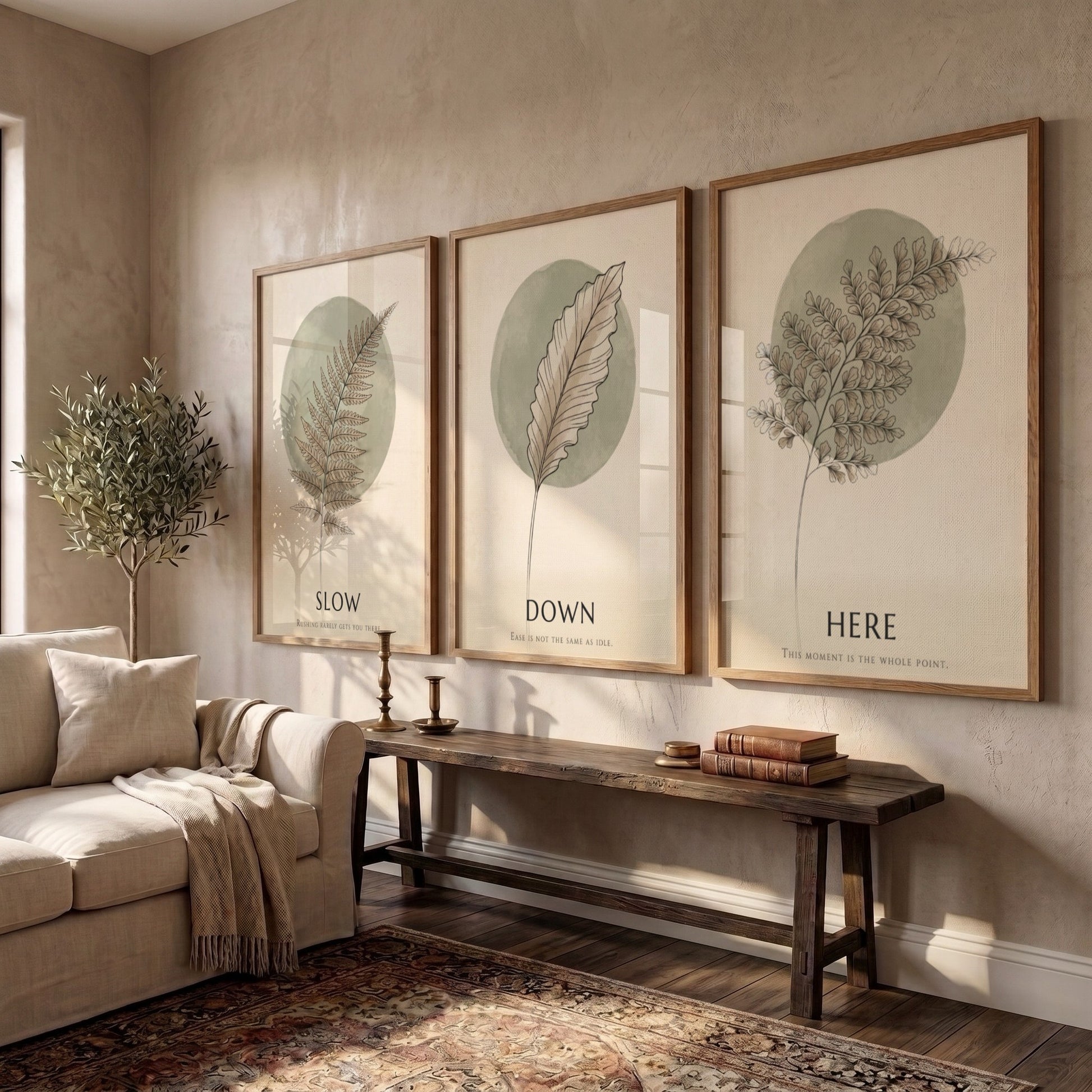 Poster triptych featuring delicate fern and feather illustrations in sage green on cream.