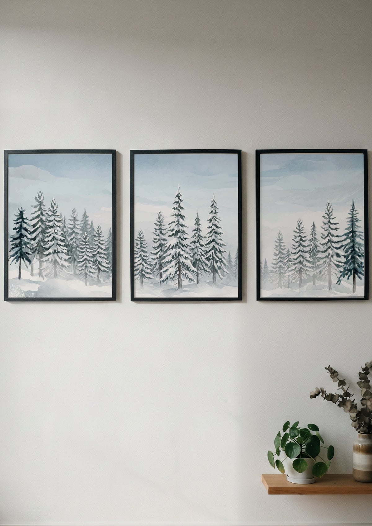 Three snowy pine forest posters with blue and white watercolour winter landscape scenes
