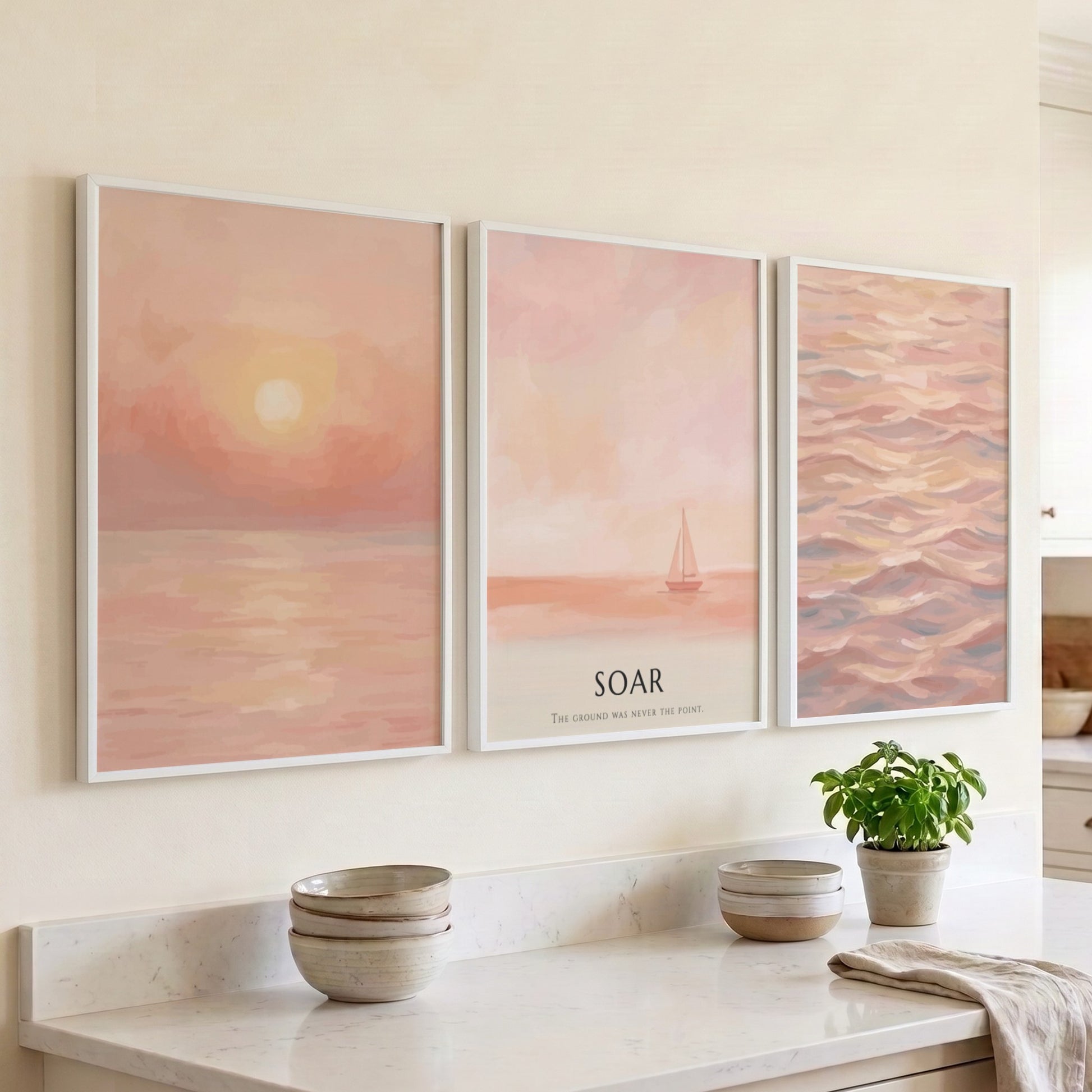 Poster triptych featuring a peaceful coastal sunset with soft peach and coral tones