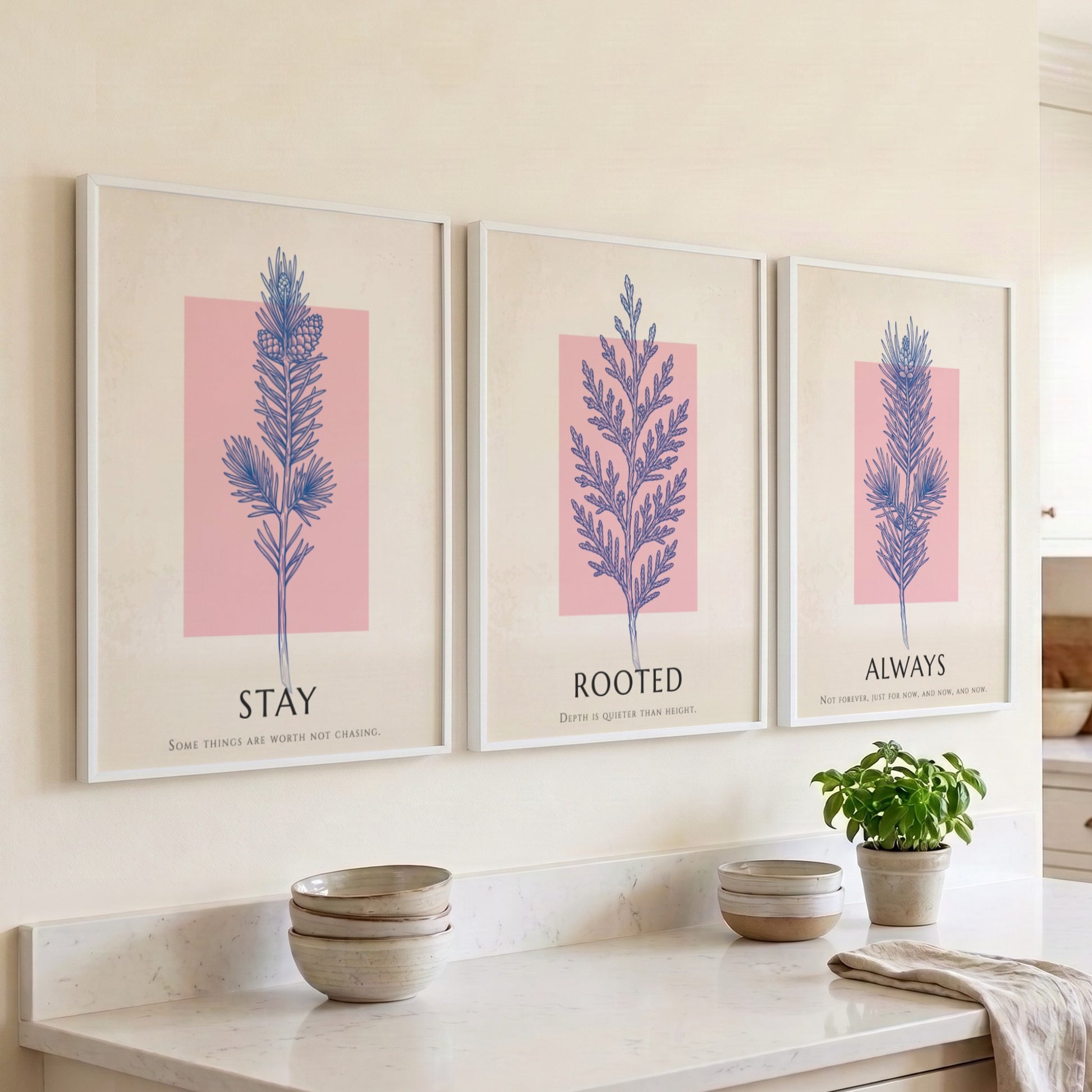 Poster set featuring three botanical prints with navy foliage on cream and blush backgrounds.