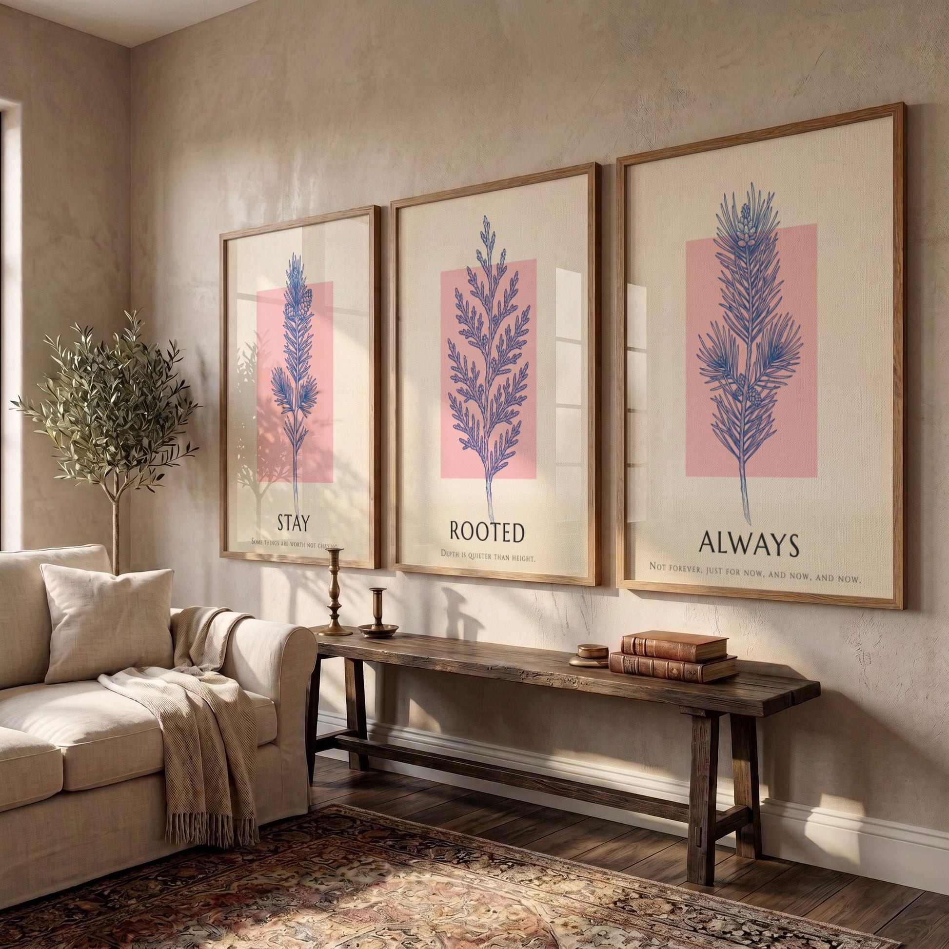 Poster set featuring three botanical prints with navy foliage on cream and blush backgrounds.