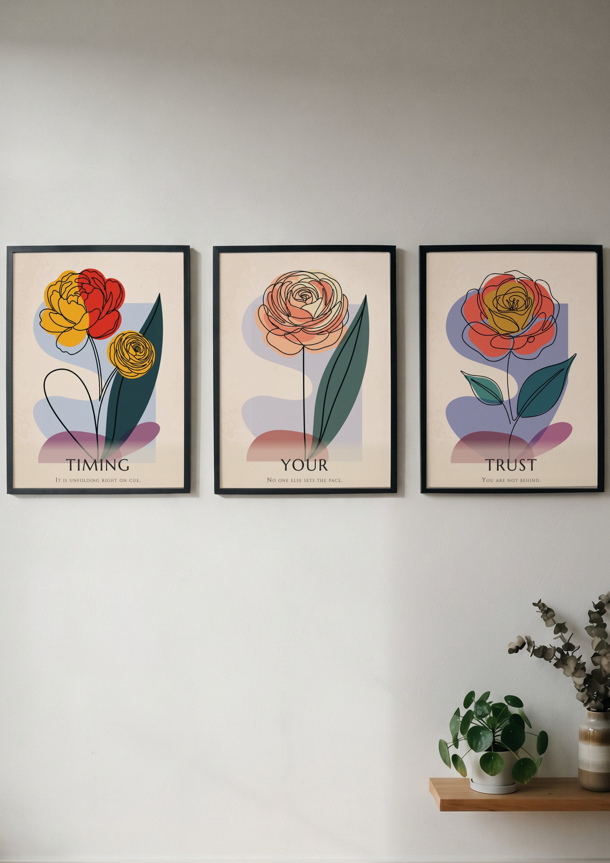 Poster set featuring three minimalist flowers with the text Trust Your Timing displayed