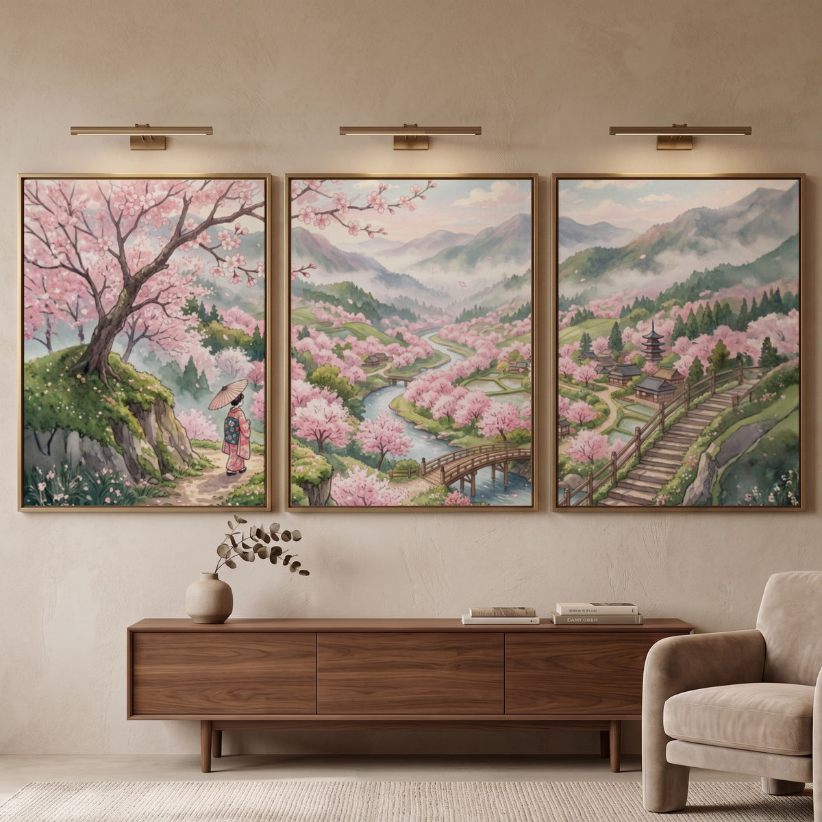 Three framed landscape prints showing pink cherry blossoms, winding rivers, and mountains in Japan.