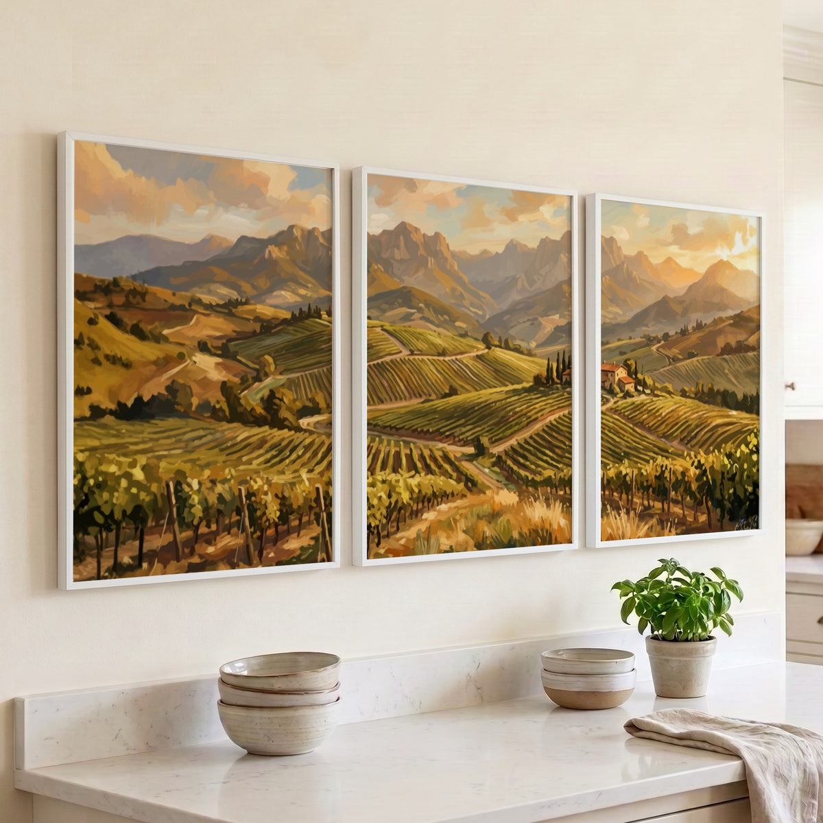 Triptych of Tuscan vineyard landscape paintings featuring rolling hills, grapevines, and distant mountains.
