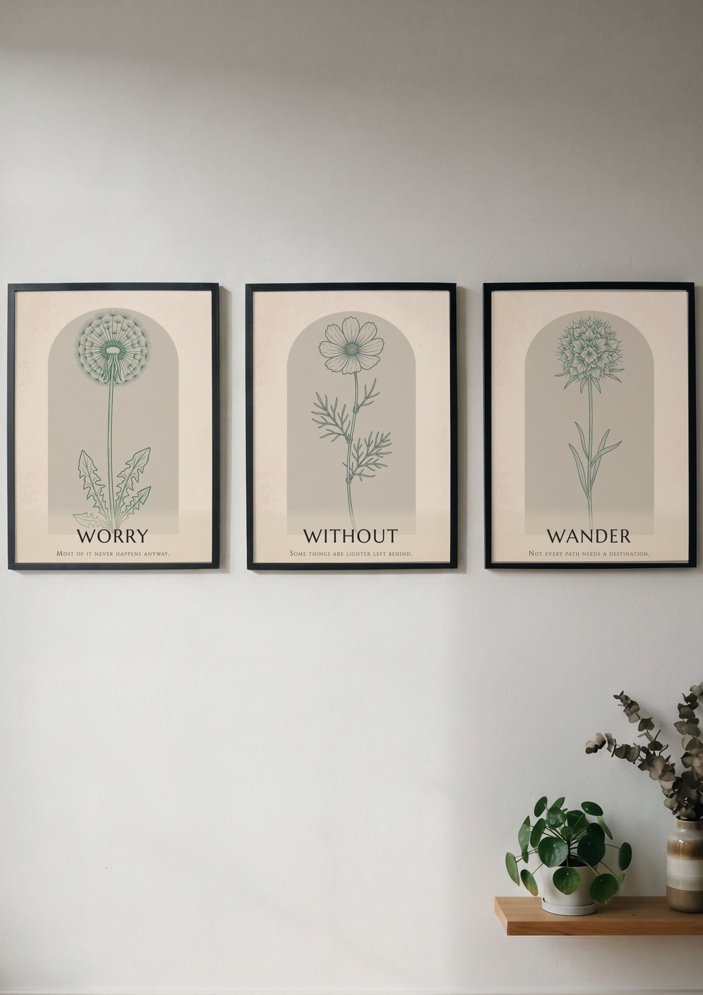 Poster set displaying three sage green wildflower illustrations within arched frames on beige.