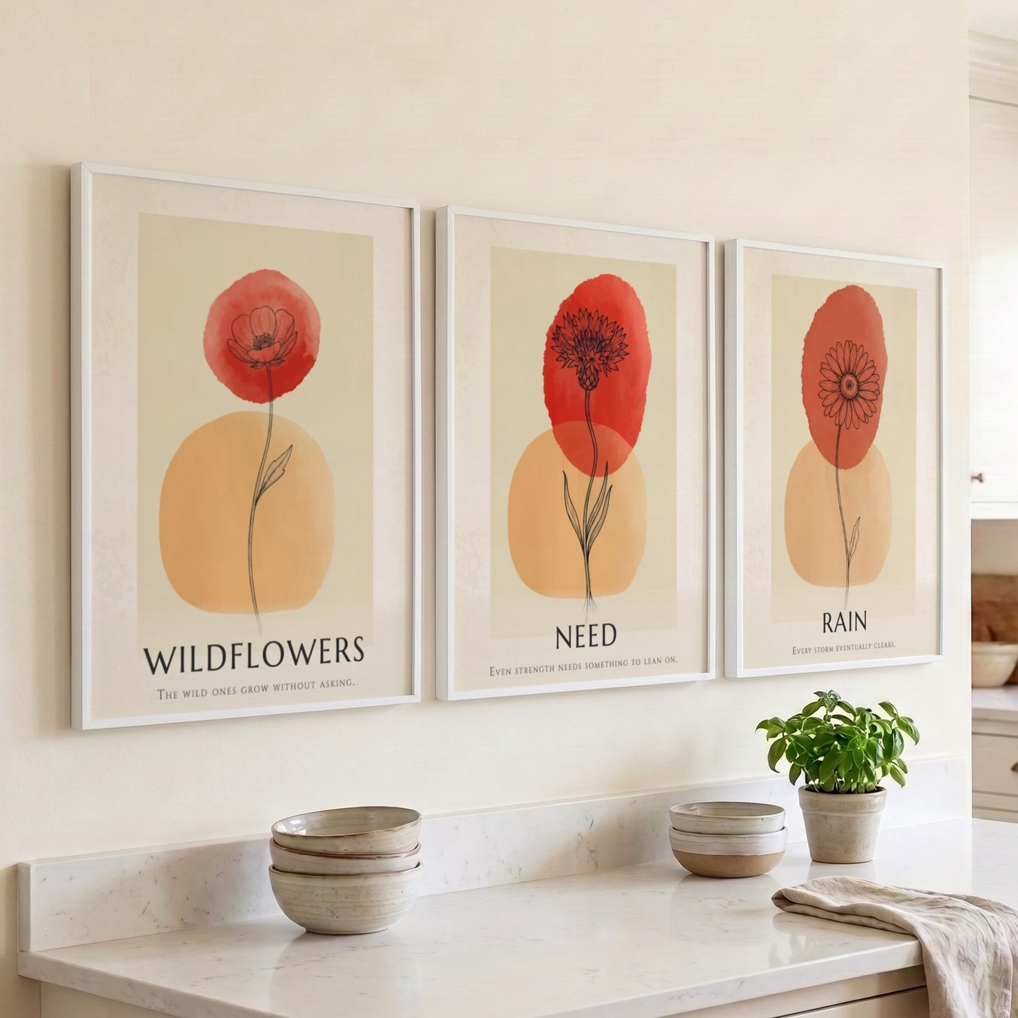 Poster trio featuring Rain Need Wildflowers text with delicate floral ink illustrations and terracotta.