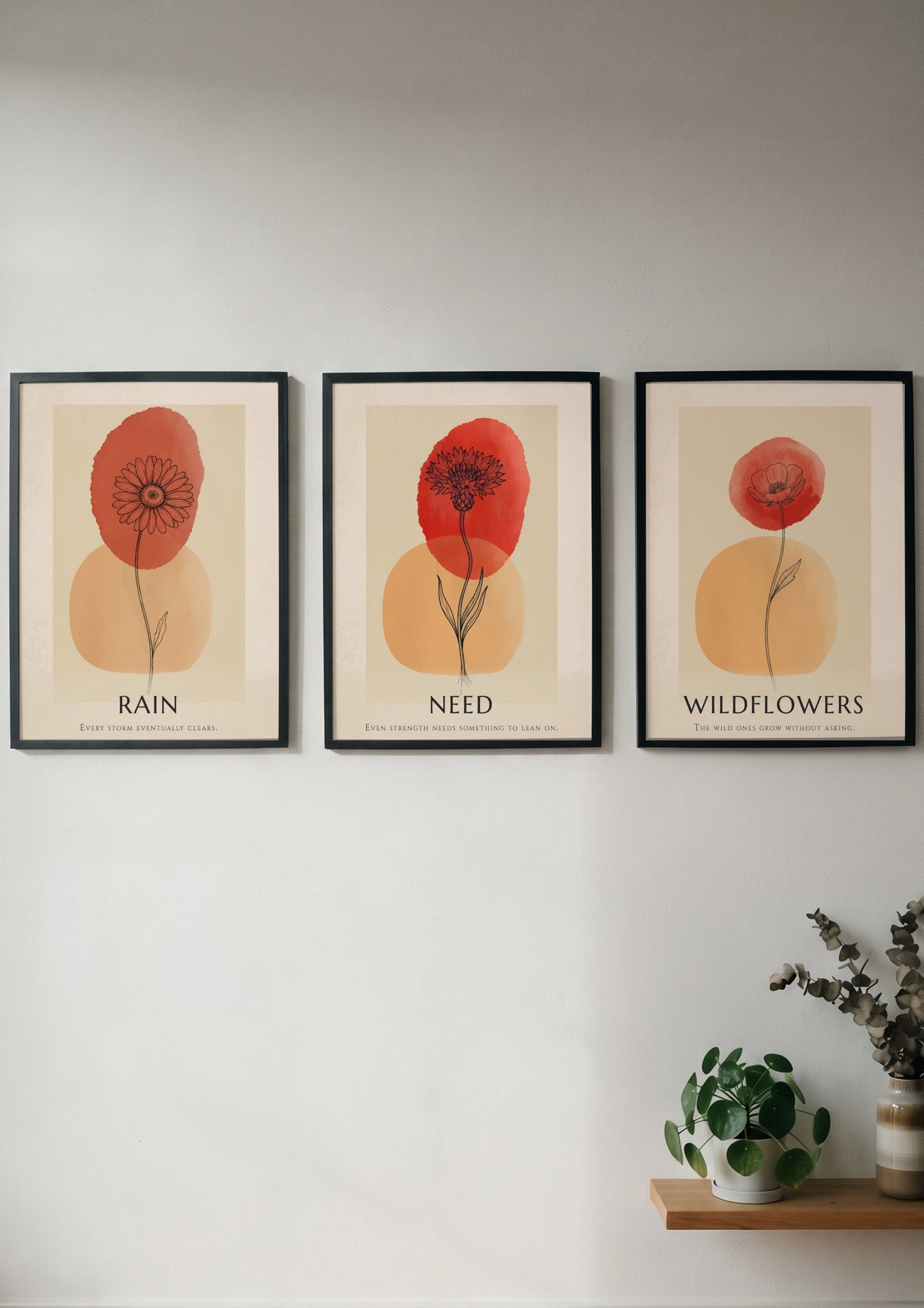Poster trio featuring Rain Need Wildflowers text with delicate floral ink illustrations and terracotta.