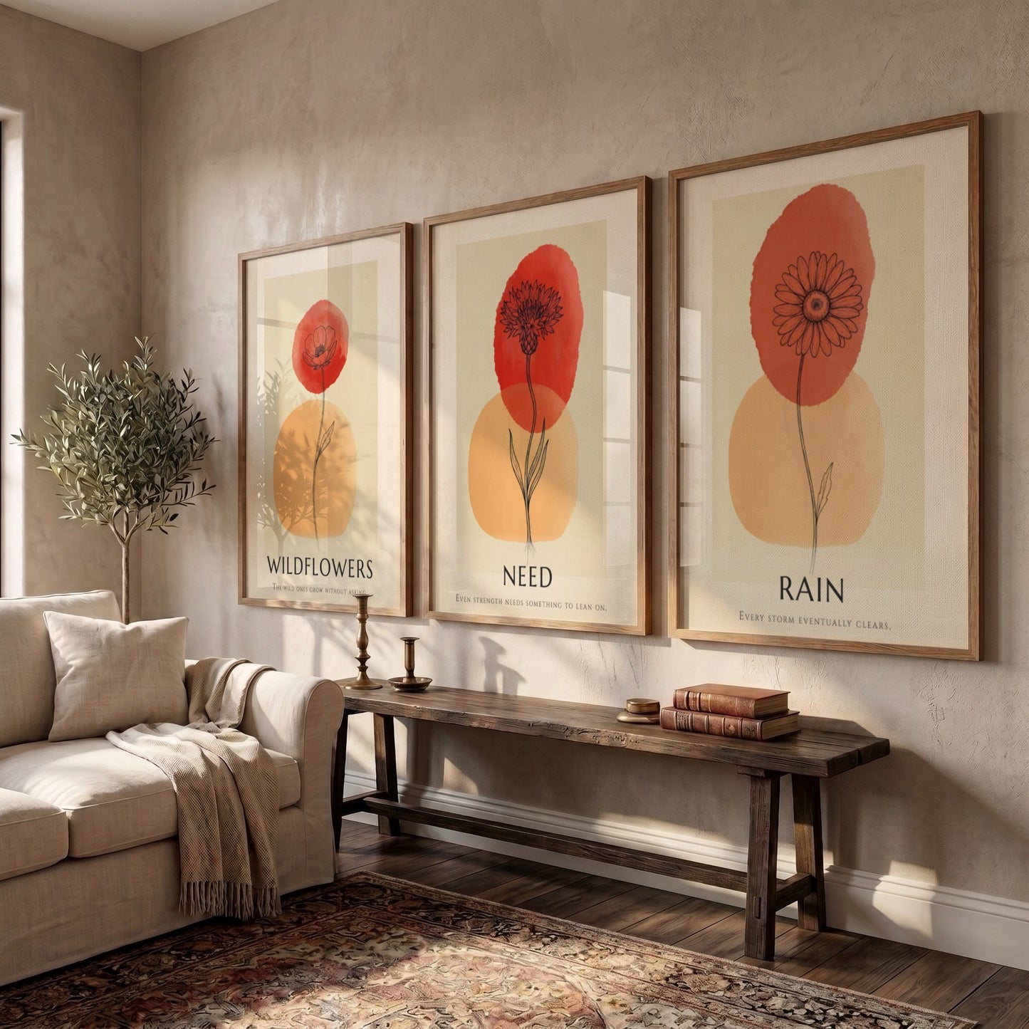 Poster trio featuring Rain Need Wildflowers text with delicate floral ink illustrations and terracotta.