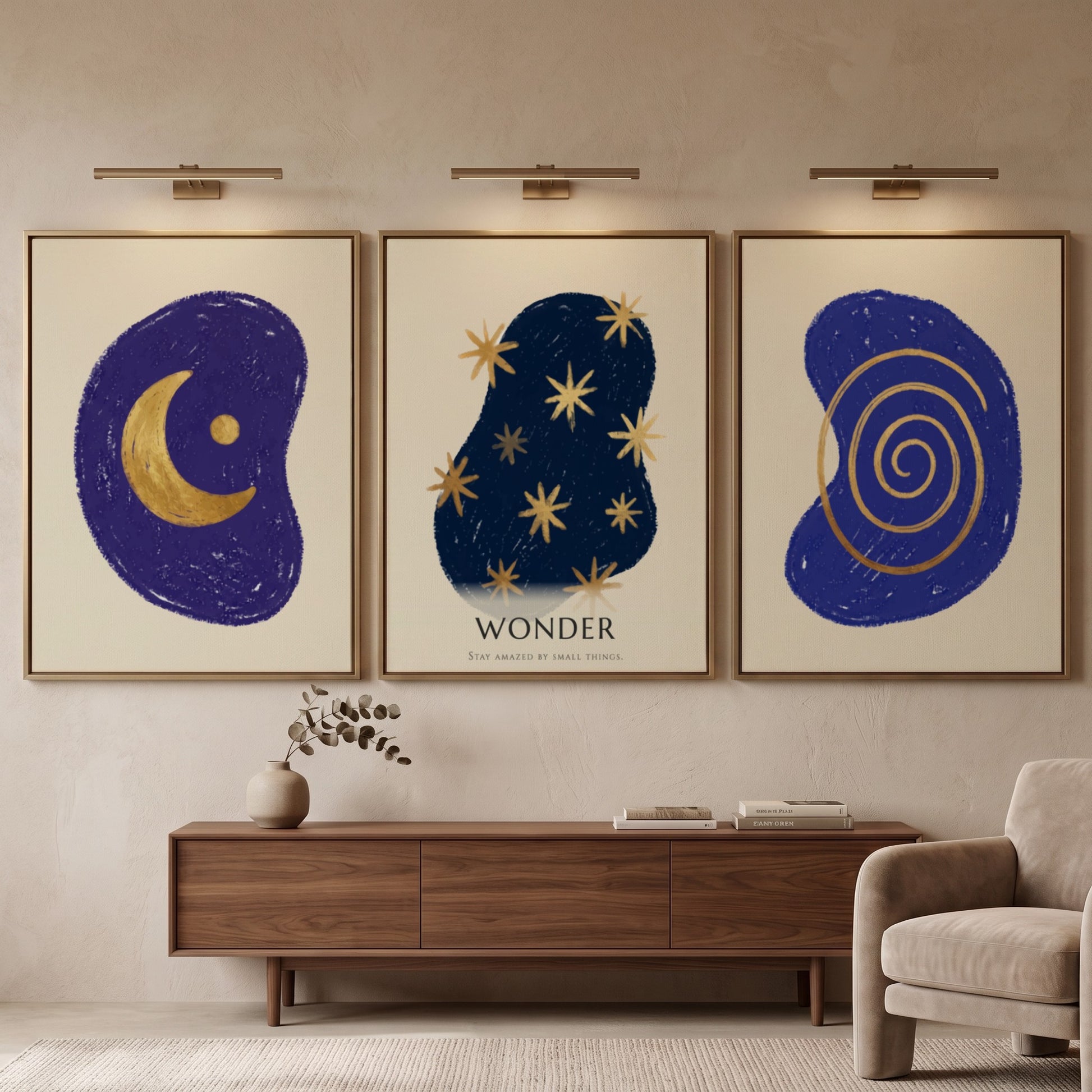 Poster triptych featuring navy blue abstract shapes with golden spiral stars and moon
