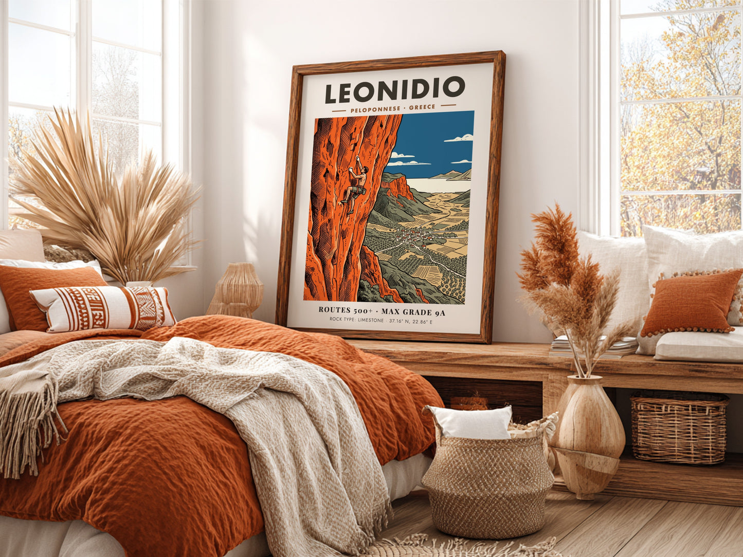 Poster of a climber on orange limestone cliffs overlooking the town of Leonidio