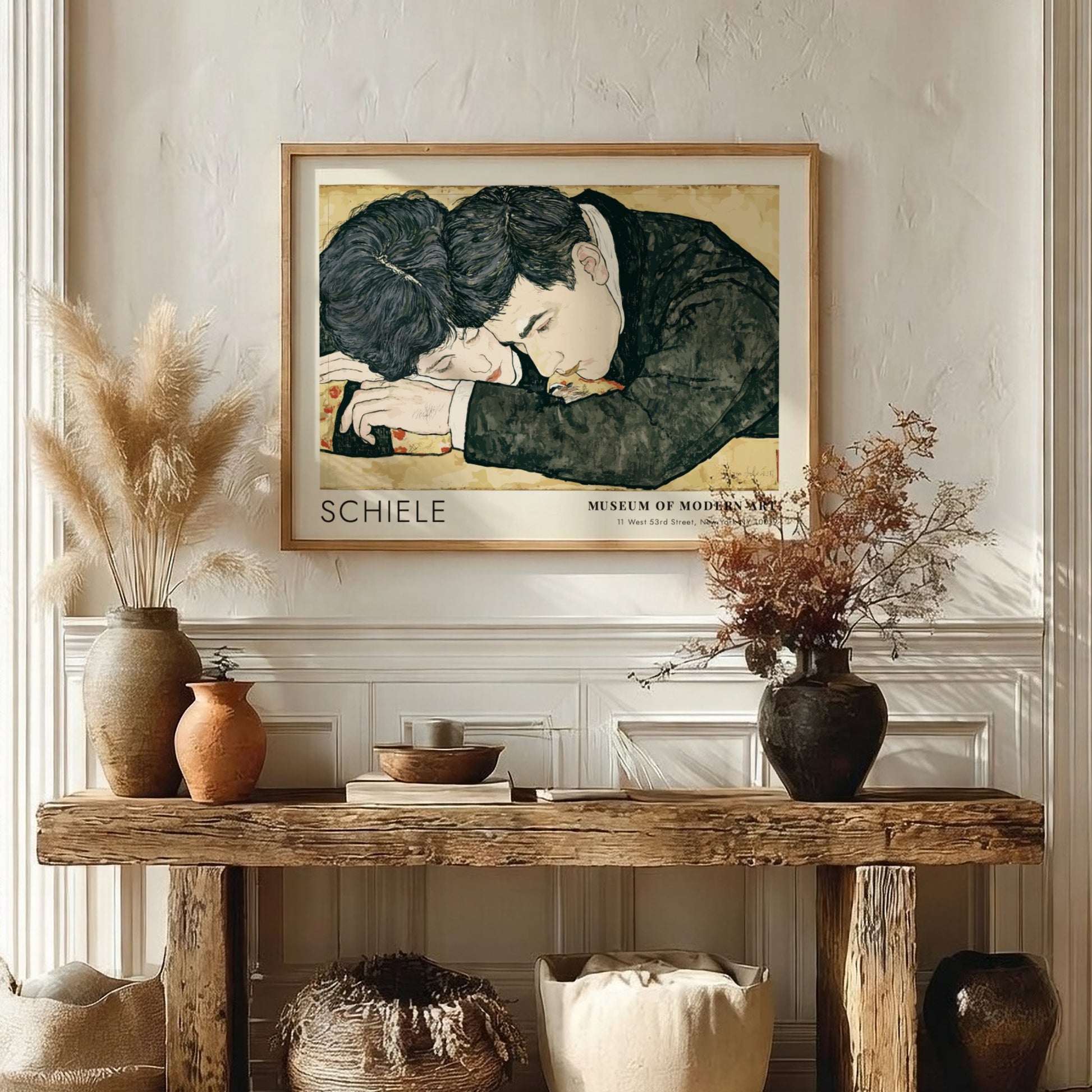 Wall art poster featuring Egon Schiele couple illustration in a wooden frame hanging