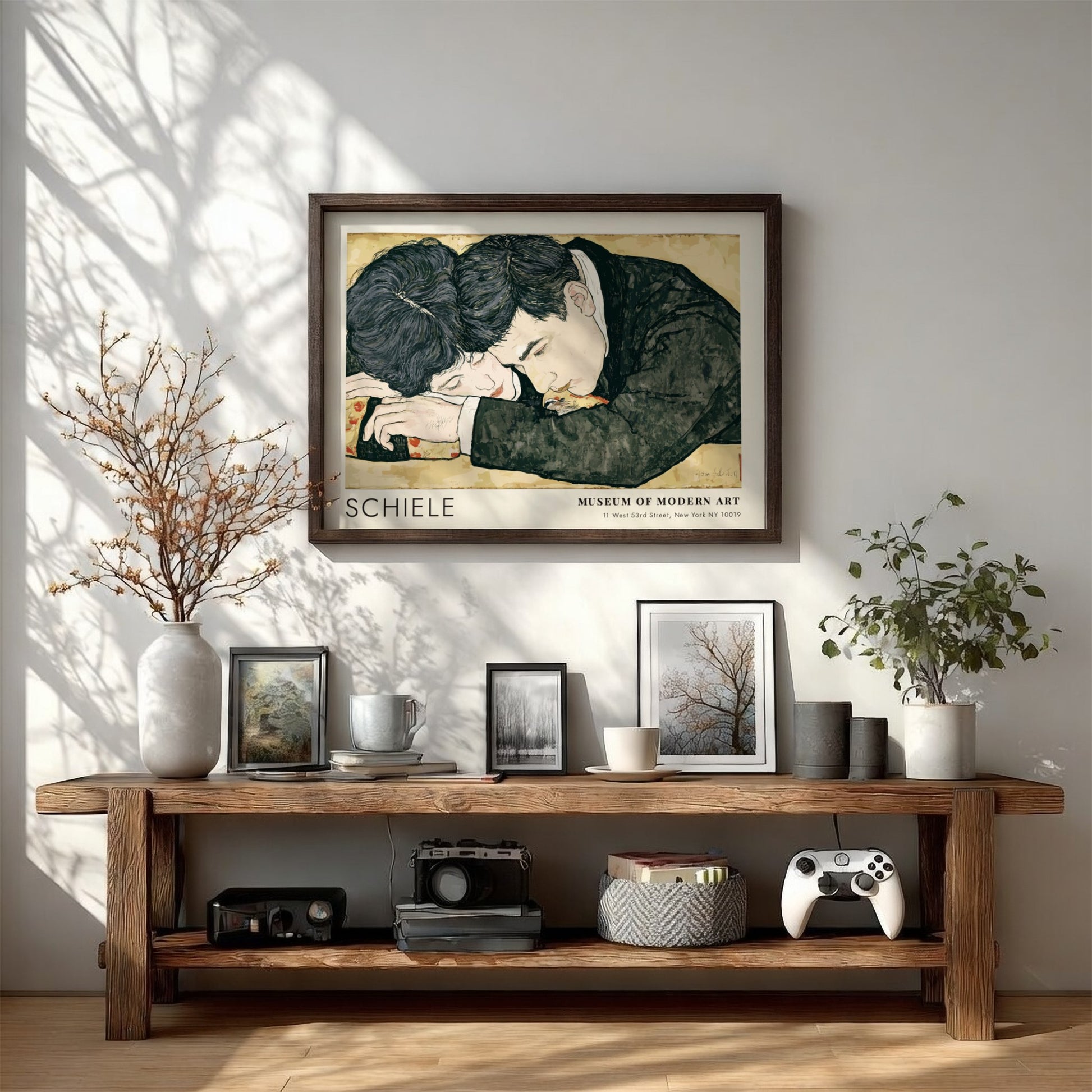 Wall art poster featuring Egon Schiele couple illustration in a wooden frame hanging