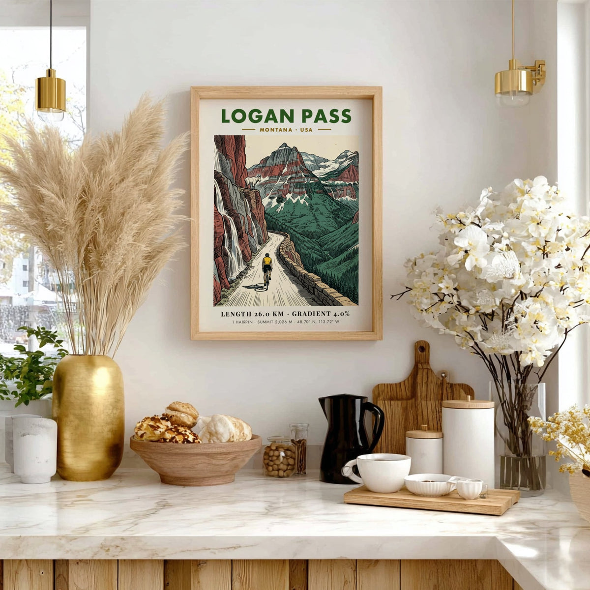 Poster showing a cyclist climbing Logan Pass, Montana with red cliffs and goats.
