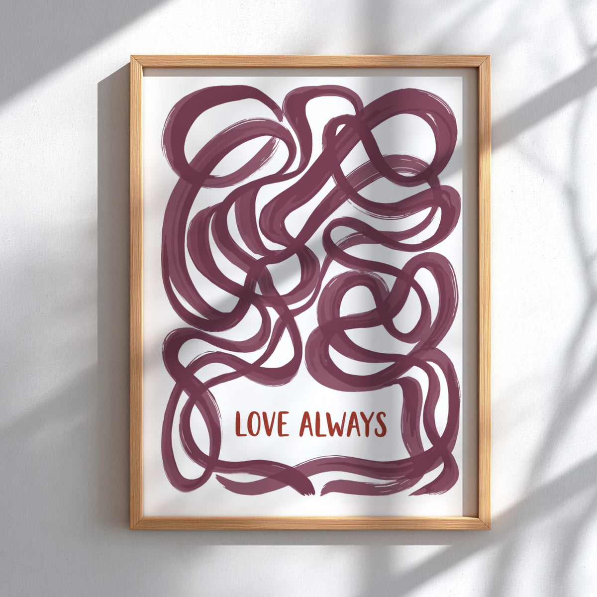 Motivational poster featuring deep plum ribbon loops surrounding the text Love Always in script