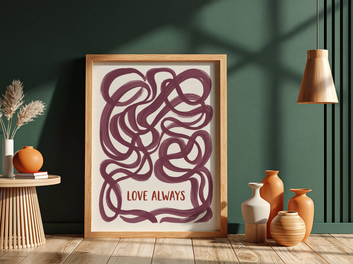 Motivational poster featuring deep plum ribbon loops surrounding the text Love Always in script