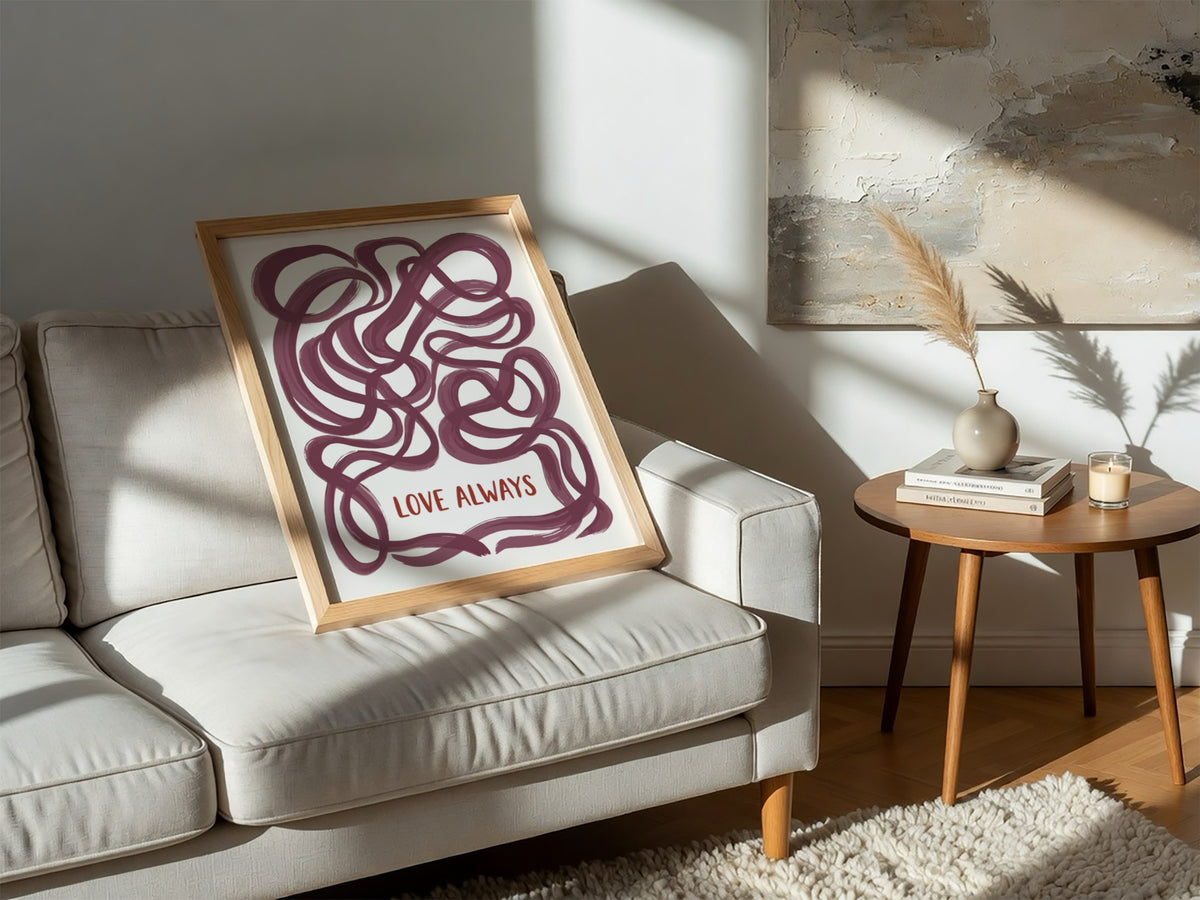 Motivational poster featuring deep plum ribbon loops surrounding the text Love Always in script