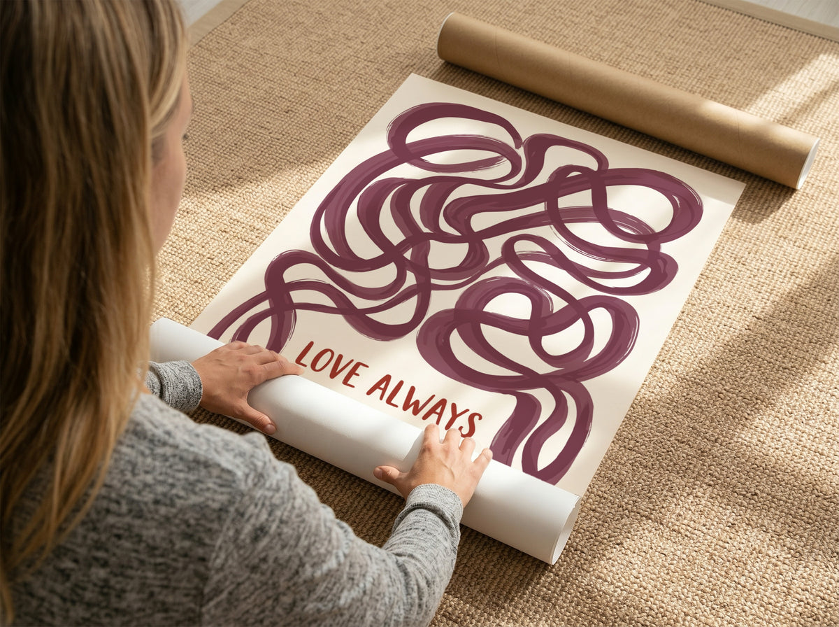 Motivational poster featuring deep plum ribbon loops surrounding the text Love Always in script
