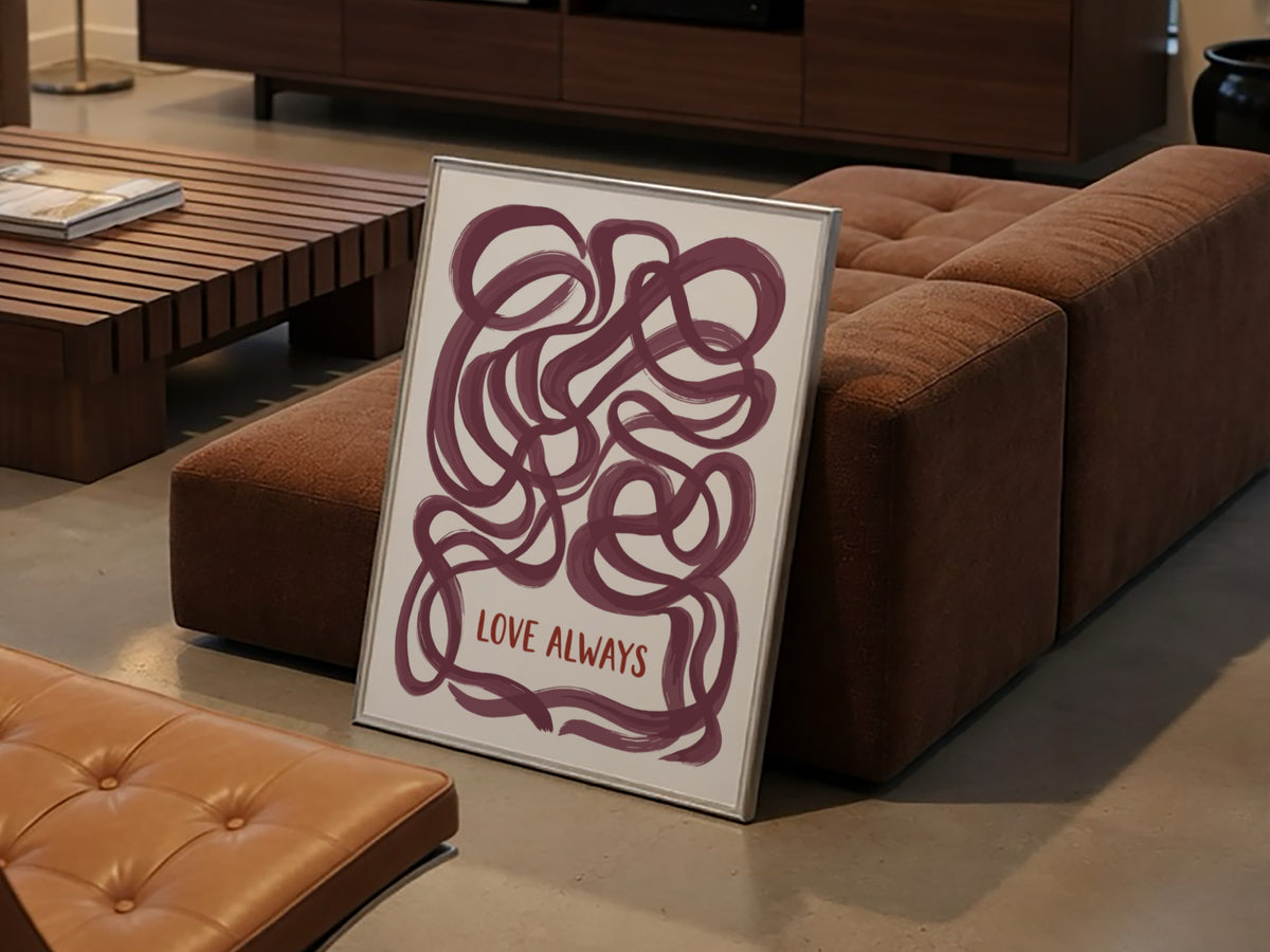 Motivational poster featuring deep plum ribbon loops surrounding the text Love Always in script