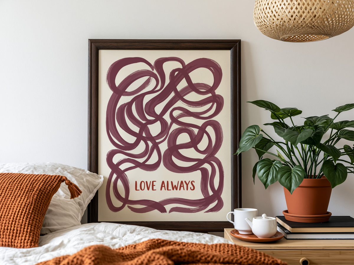 Motivational poster featuring deep plum ribbon loops surrounding the text Love Always in script
