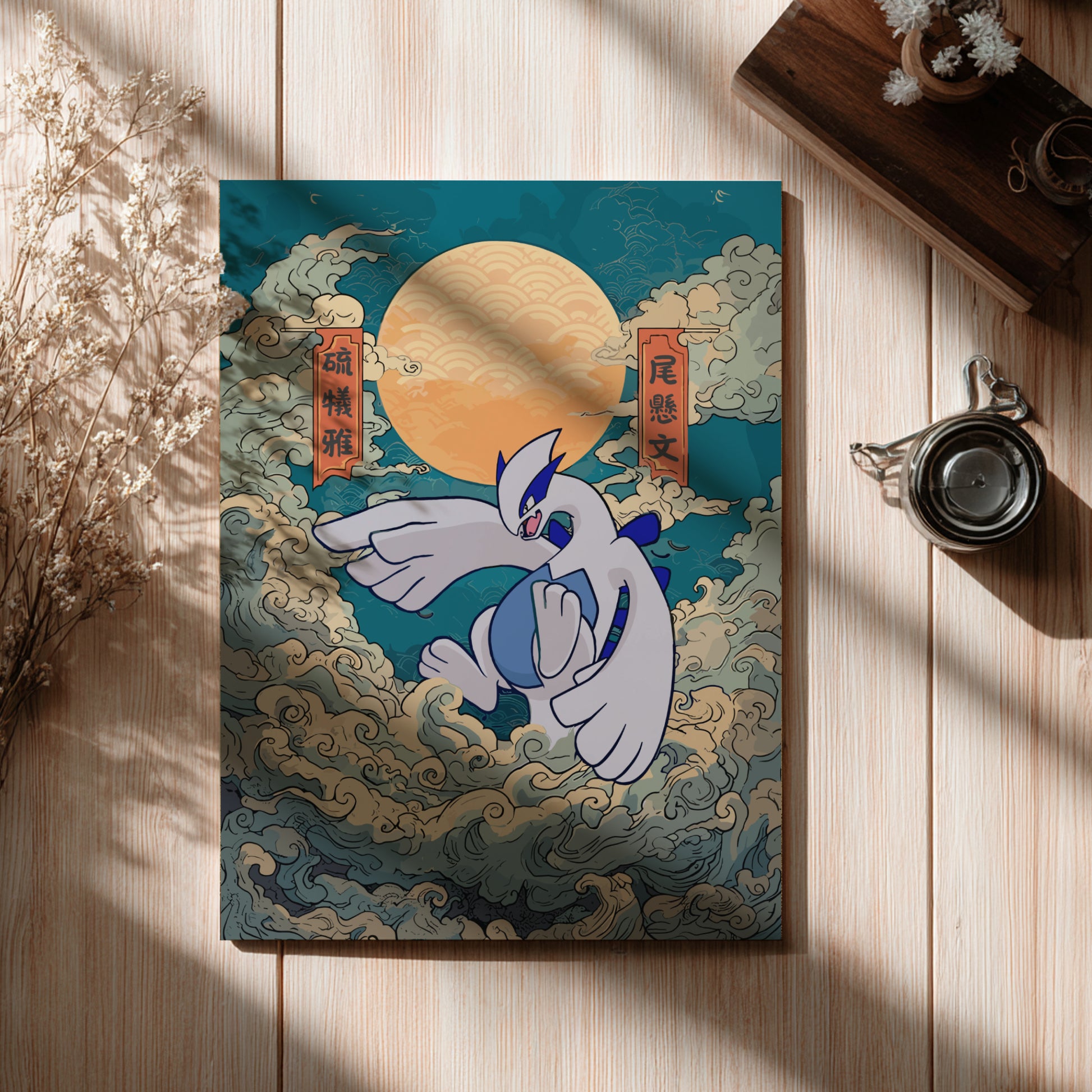Notebook with Lugia Pokemon design on a wooden surface