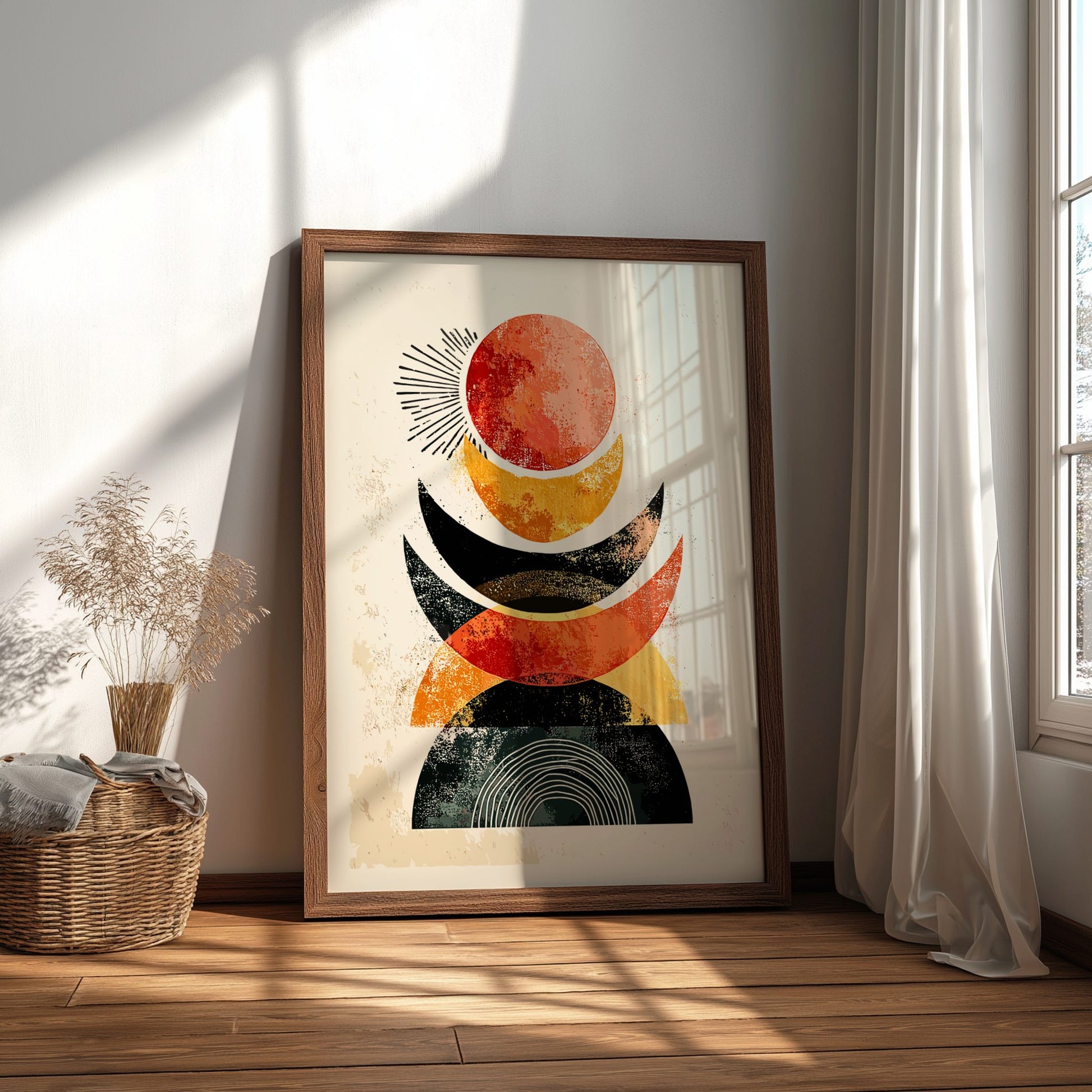 Framed abstract art piece on a wall with natural light