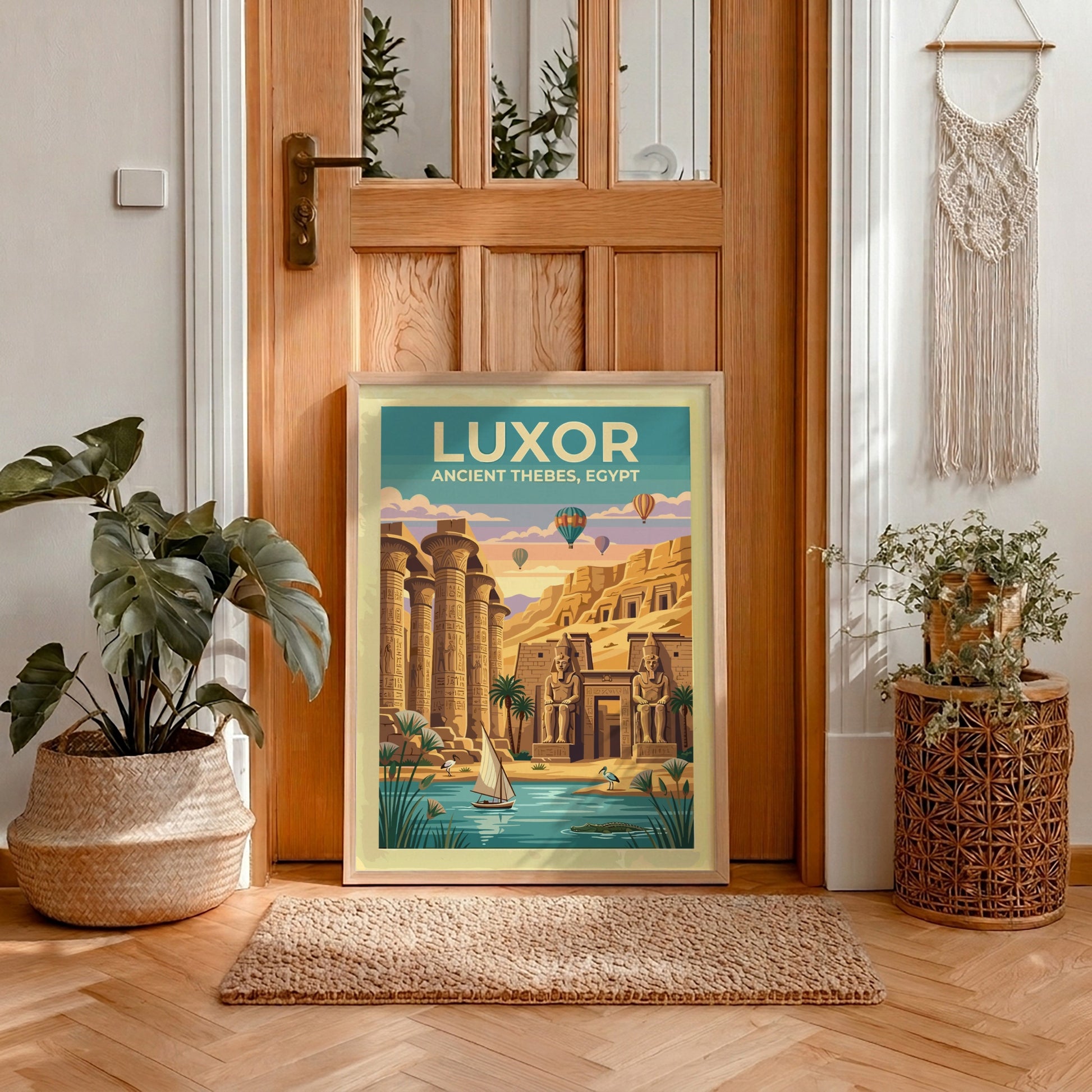 Travel poster of Luxor Ancient Thebes showing stone columns, statues, and hot air balloons.