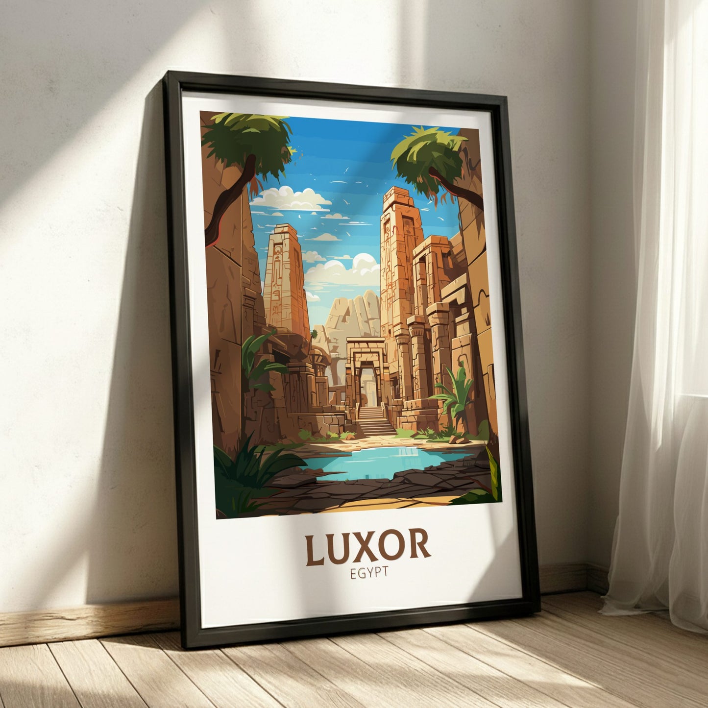 Framed poster of Luxor, Egypt with ancient temple design on a white wall.