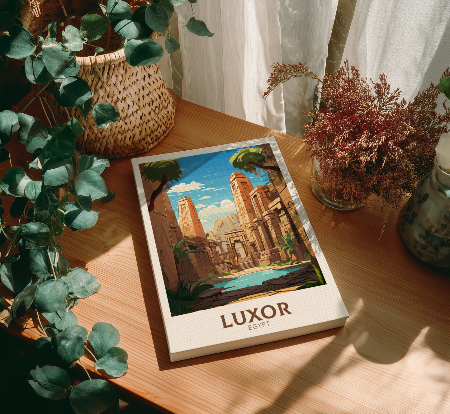 Canvas 'Luxor Egypt' on a wooden table with plants