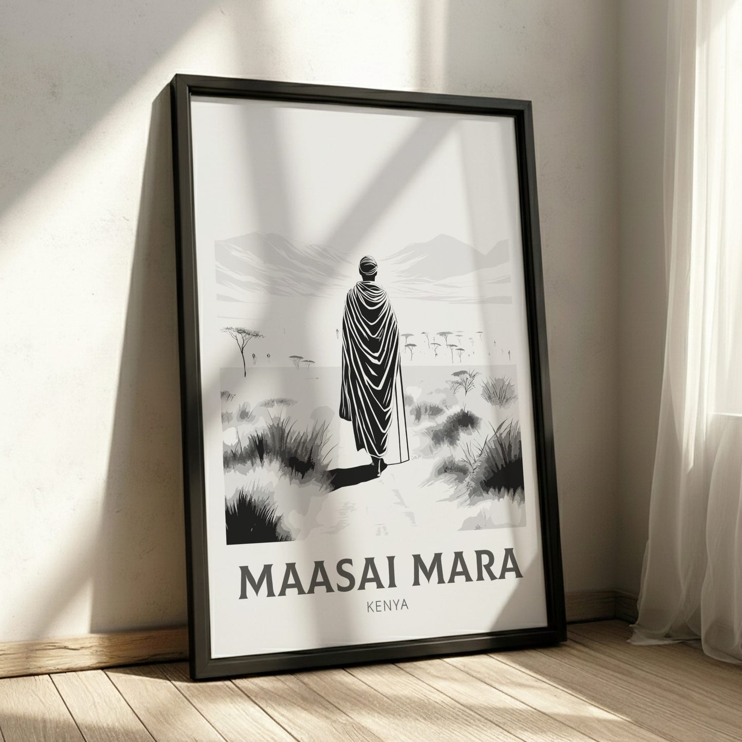 Framed poster of a person in Maasai Mara, Kenya on a wall.