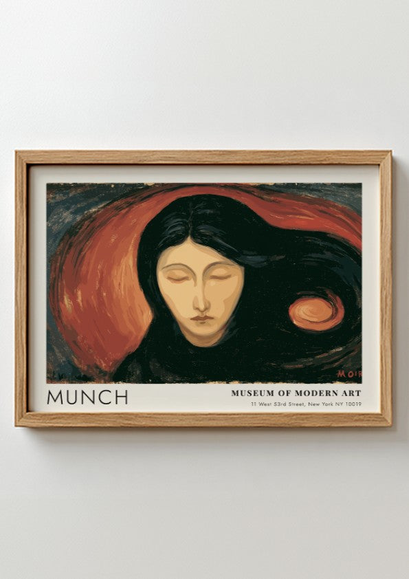 Munch Madonna exhibition poster in a light wood frame on a plain wall