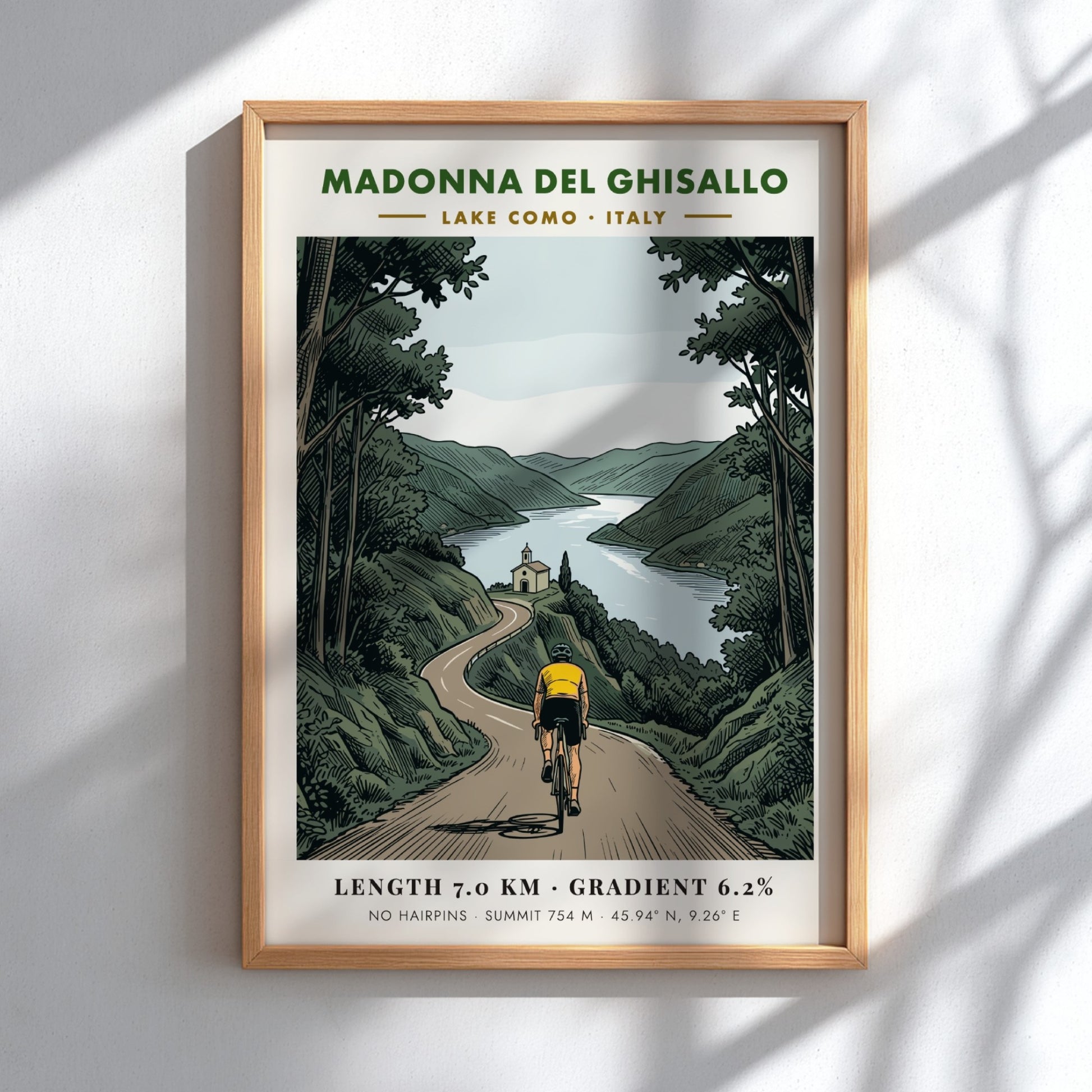 Poster featuring a cyclist climbing toward the Madonna Del Ghisallo sanctuary at Lake Como.