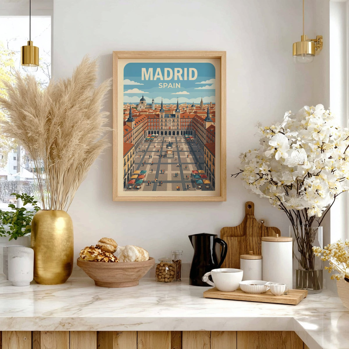 Travel poster of Madrid Spain featuring the Plaza Mayor with terracotta buildings, blue skies.