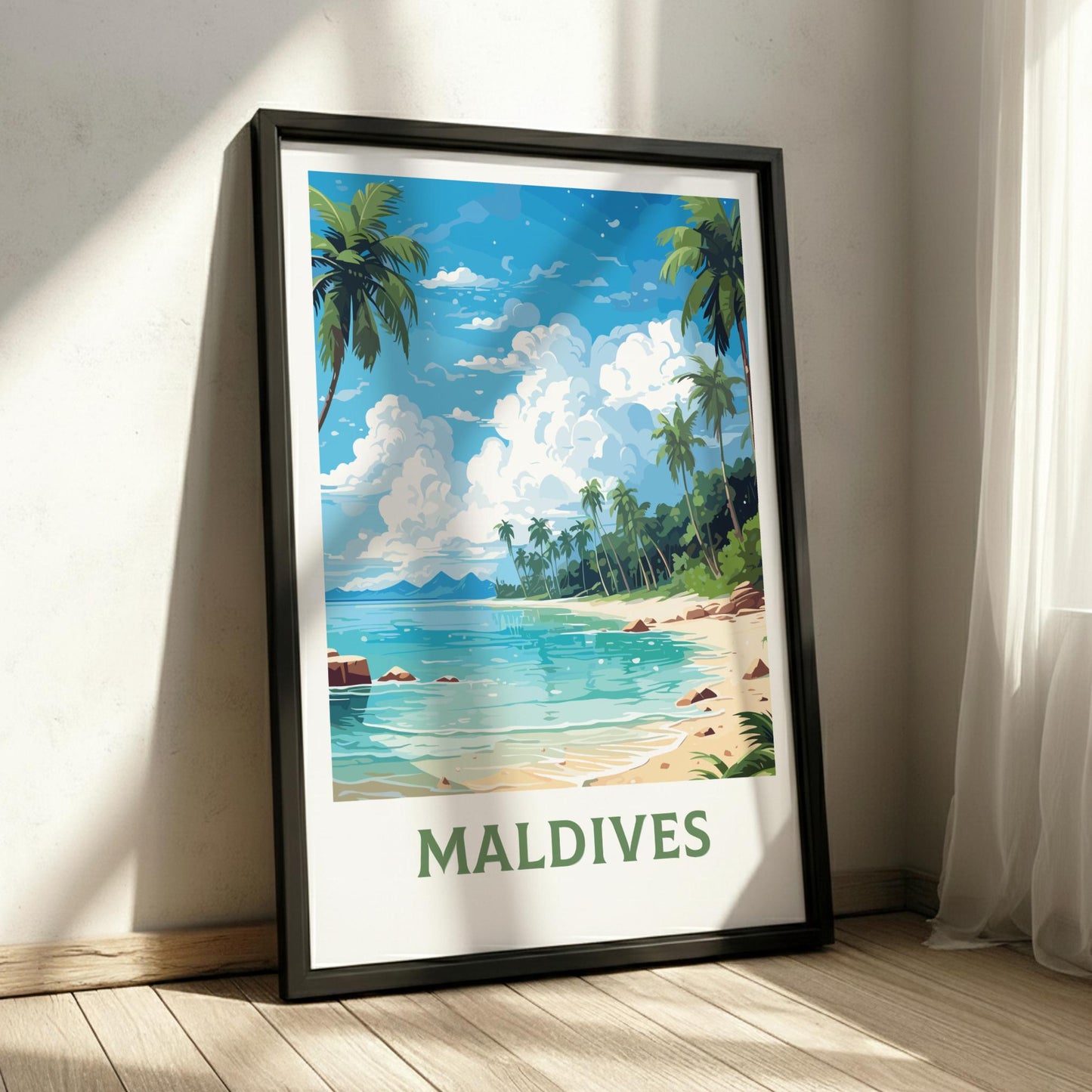 Framed poster of the Maldives with a beach and palm trees on a white wall.