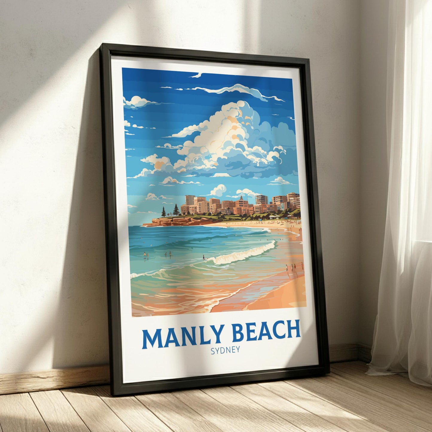 Framed artwork of Manly Beach, Sydney on a wall.