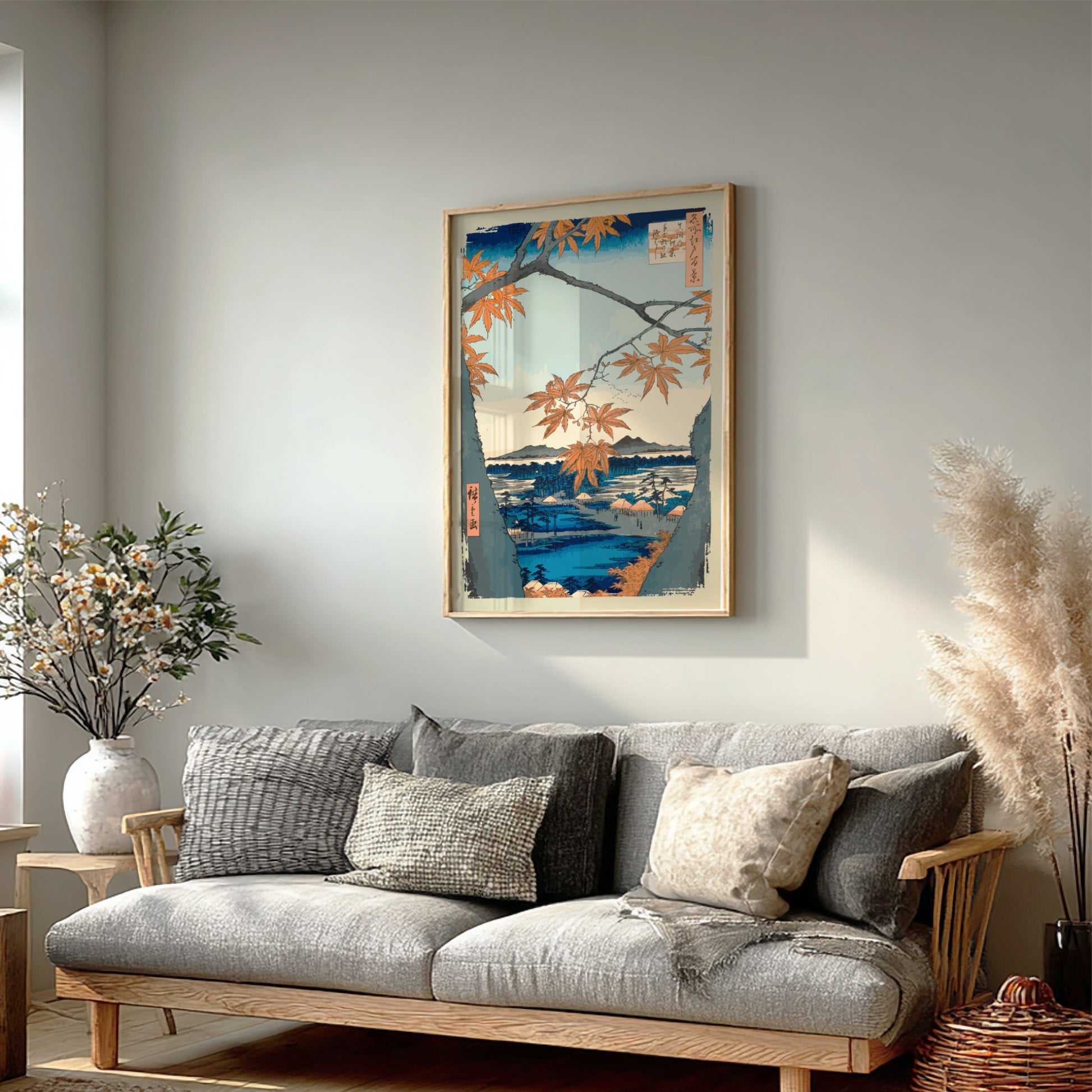 Japanese art poster of orange maple trees framing a serene landscape with water and mountains.